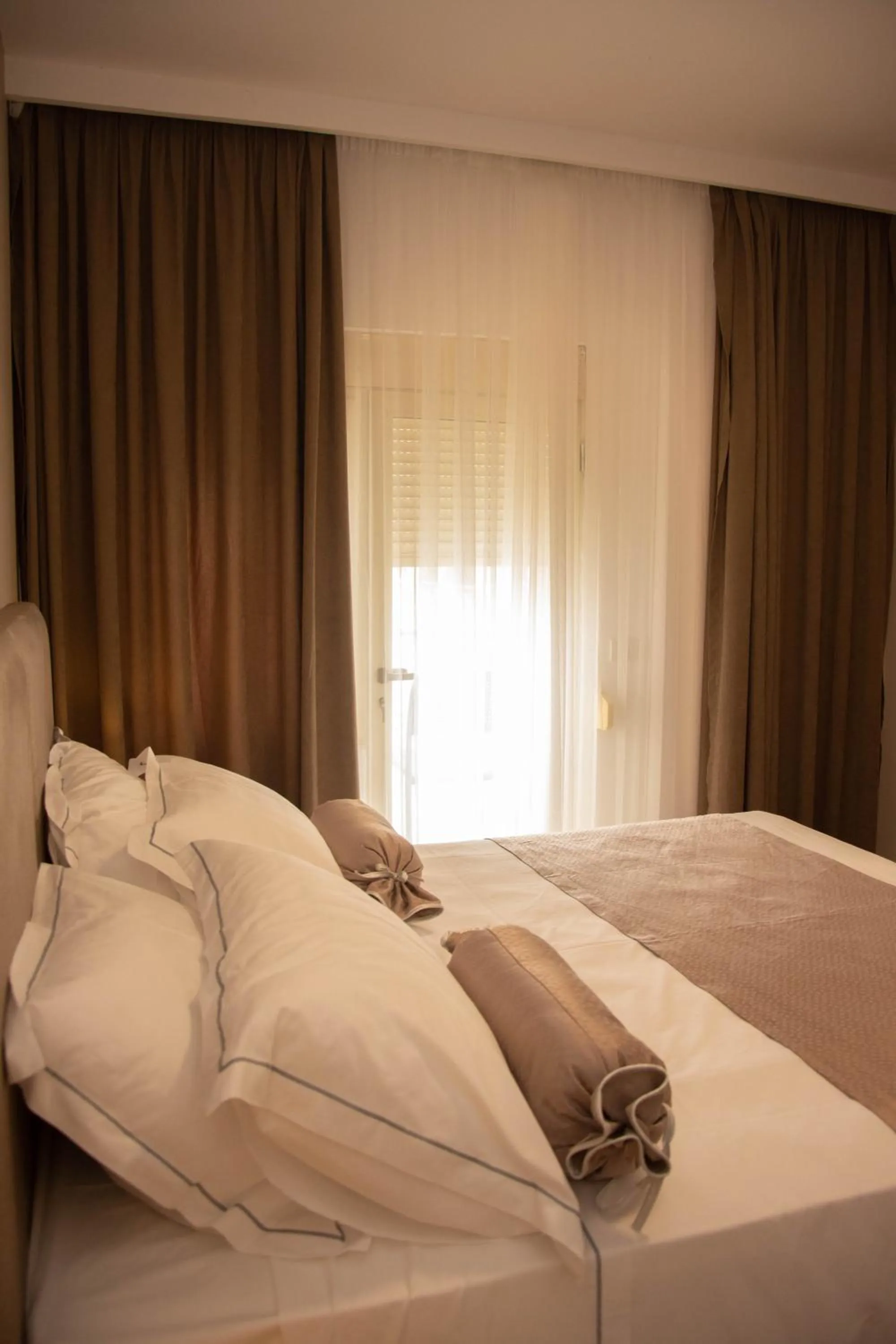 Bed in Wave Beachfront Apartments