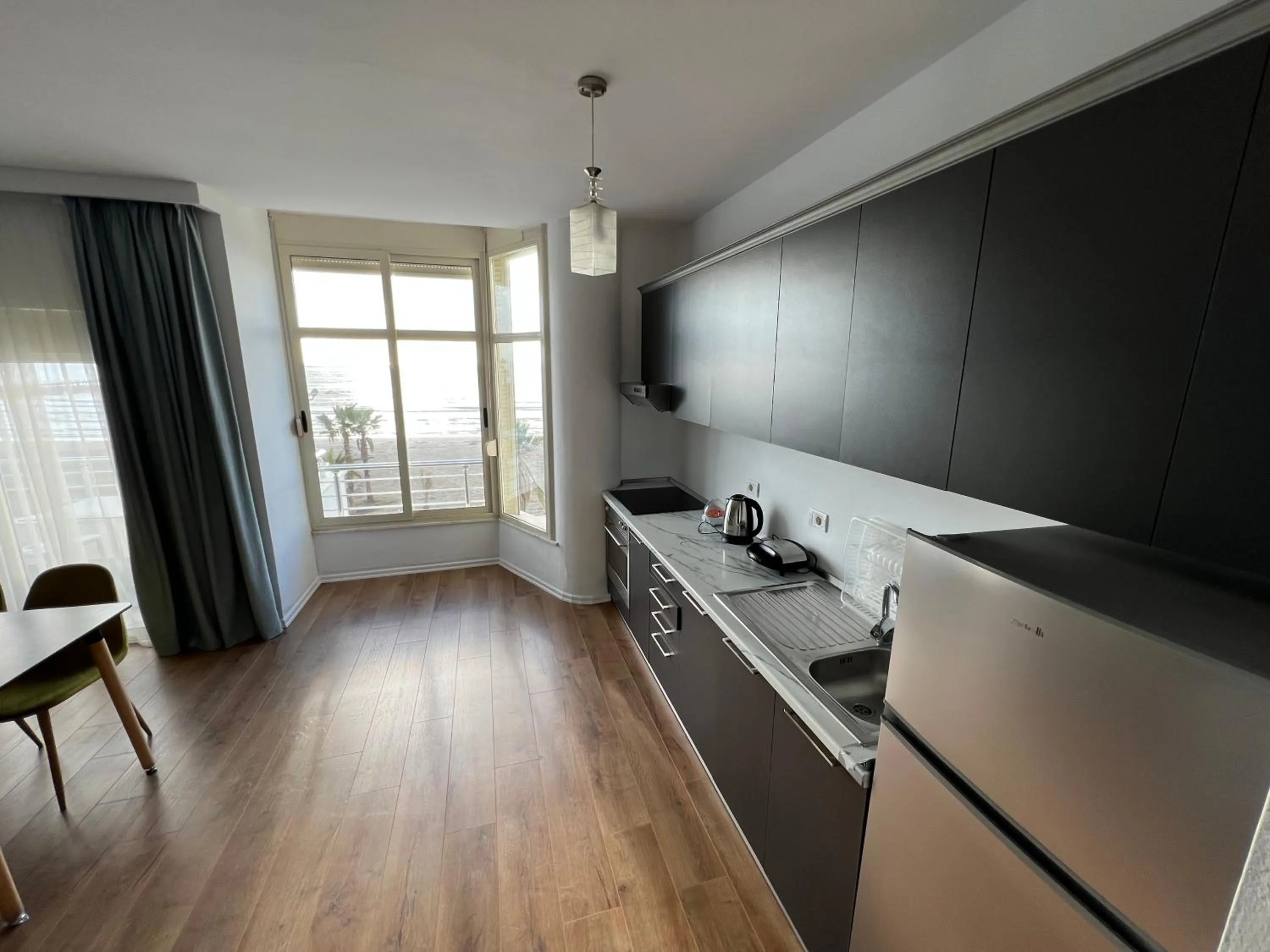 TV and multimedia in Wave Beachfront Apartments