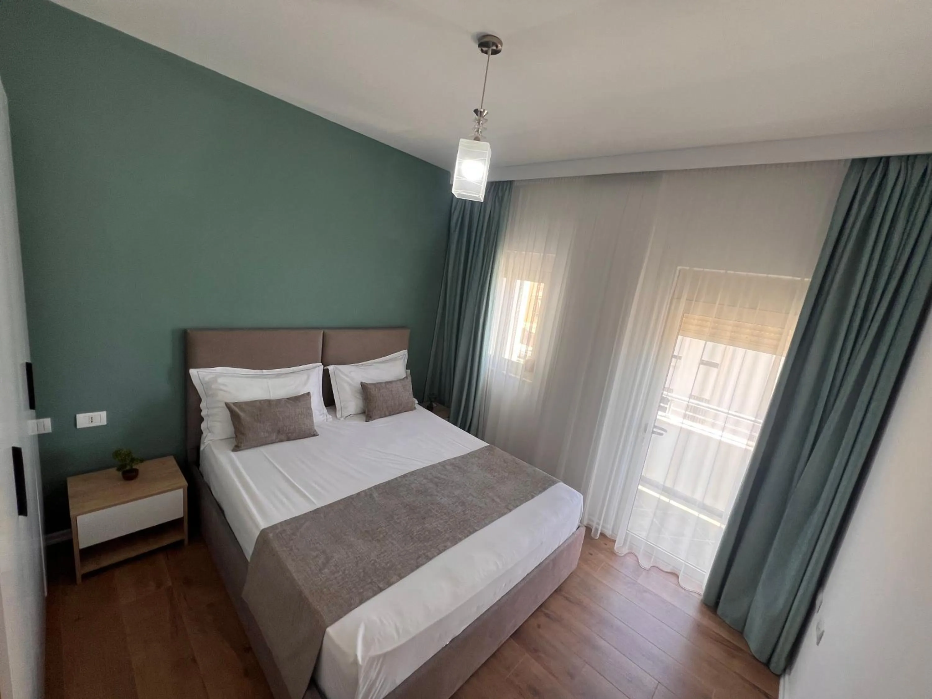 Bed in Wave Beachfront Apartments