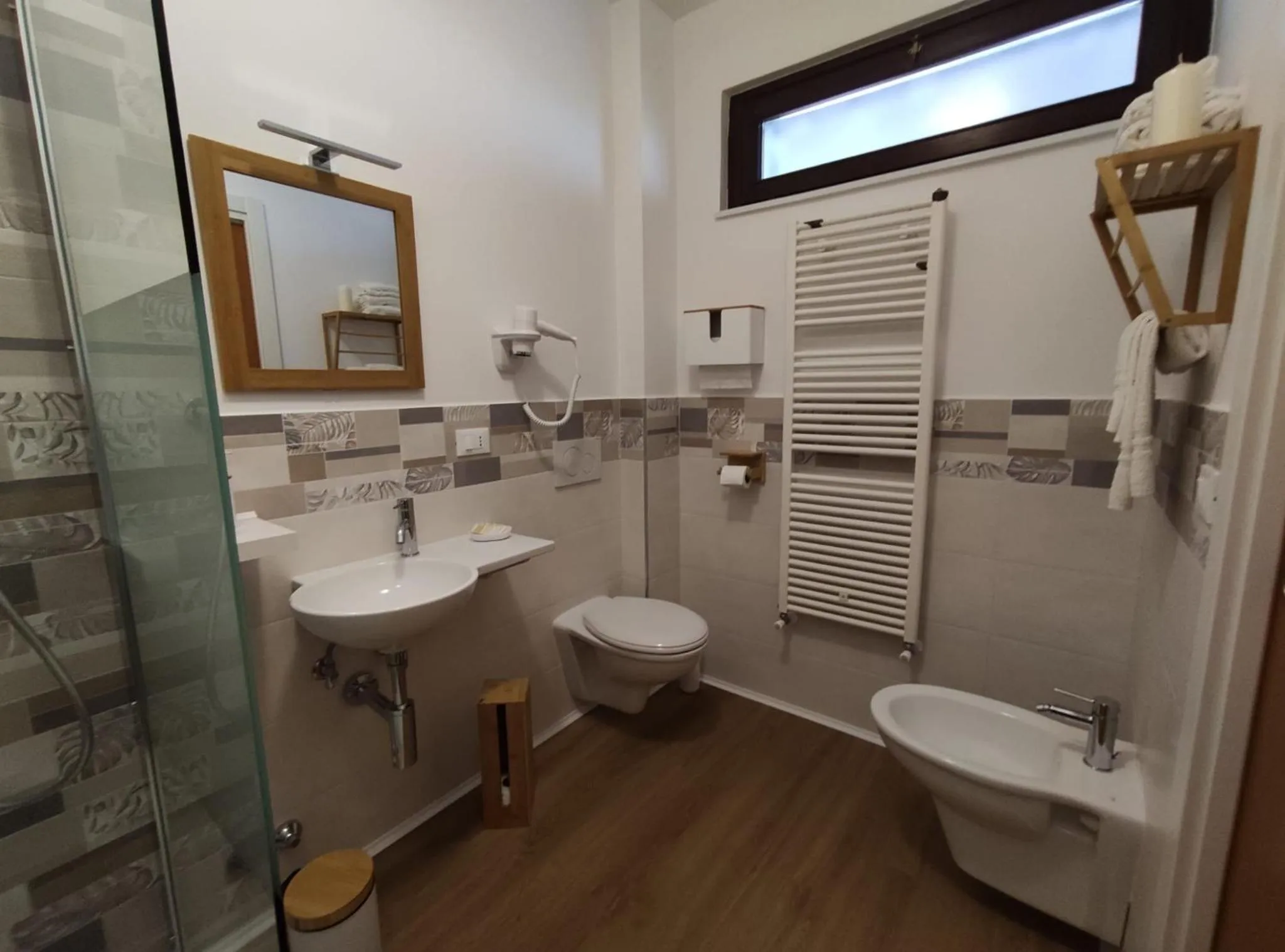 Bathroom in Loremi Rooms