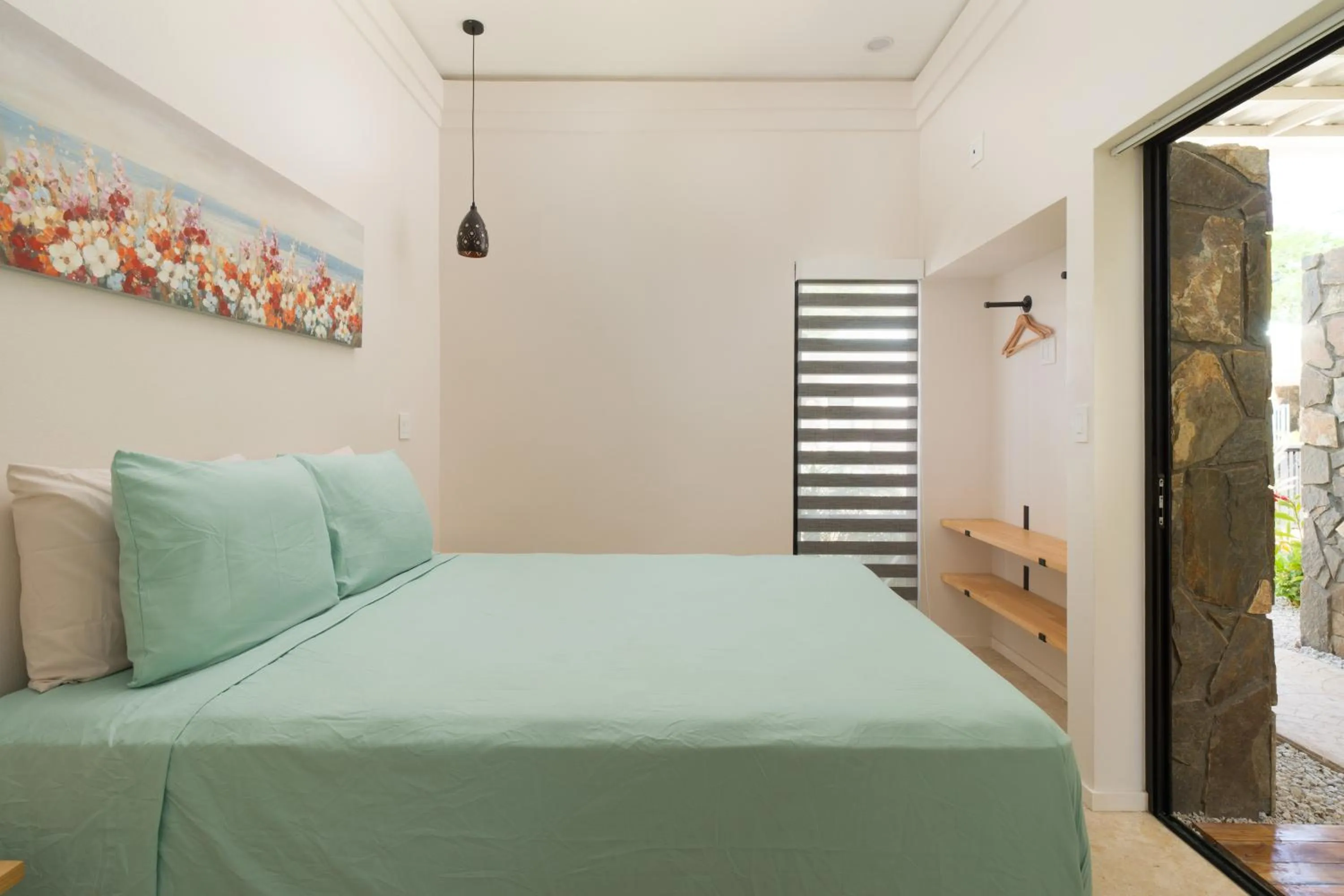 Bed in Villas VR Beachwalk Avellanas