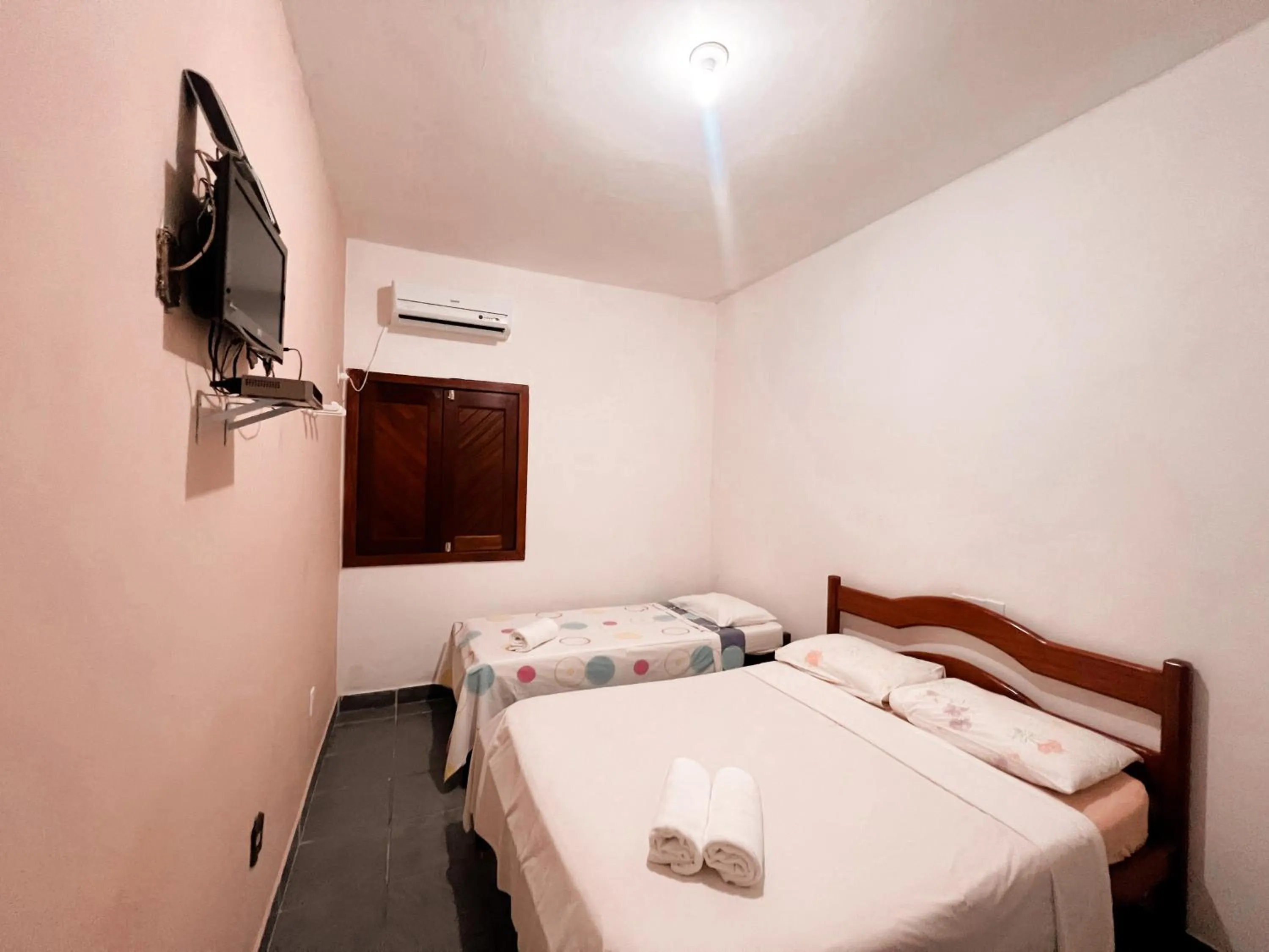 Bed in Pousada Pitanga