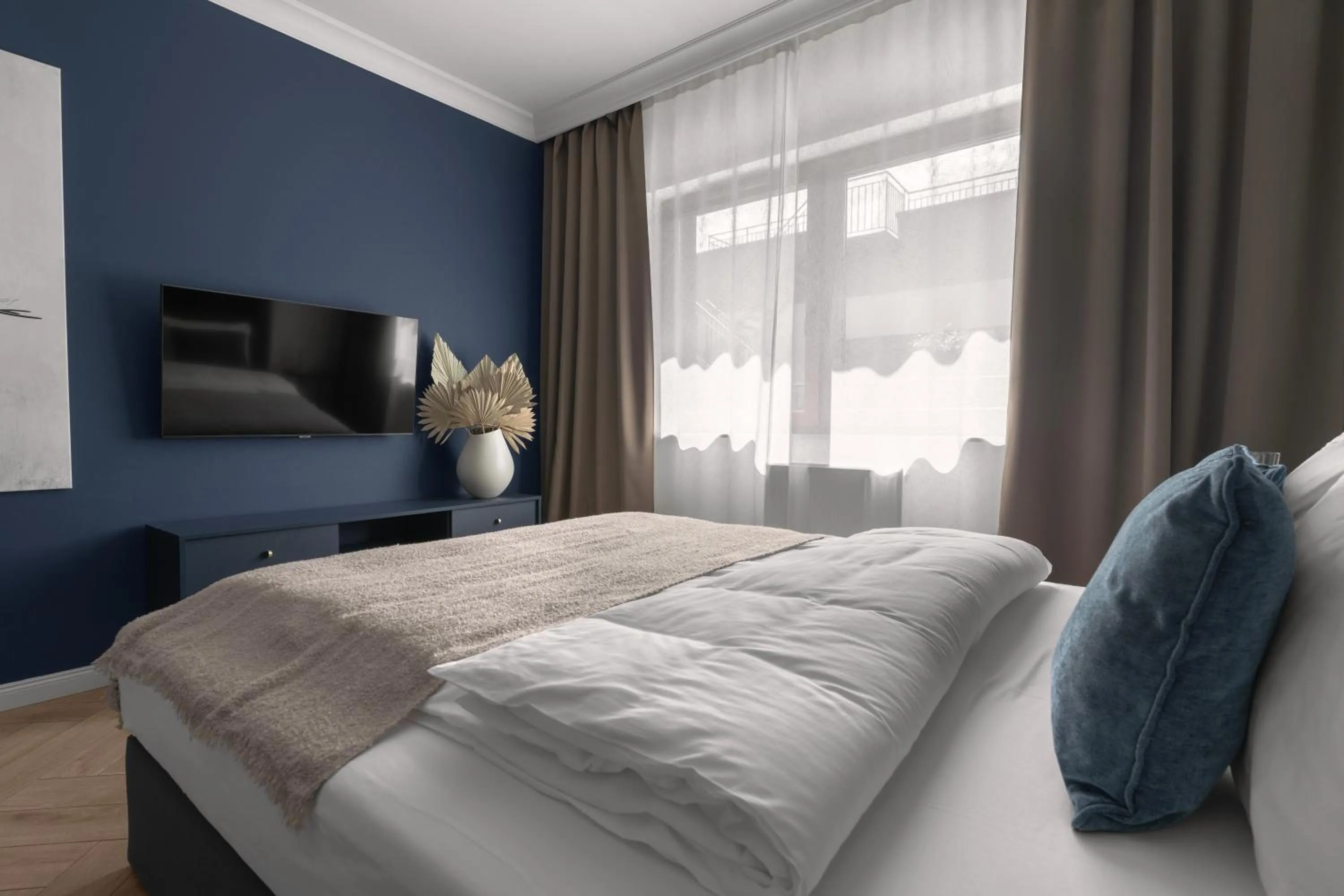 Bed in APARTIO ROOMS Gliwice