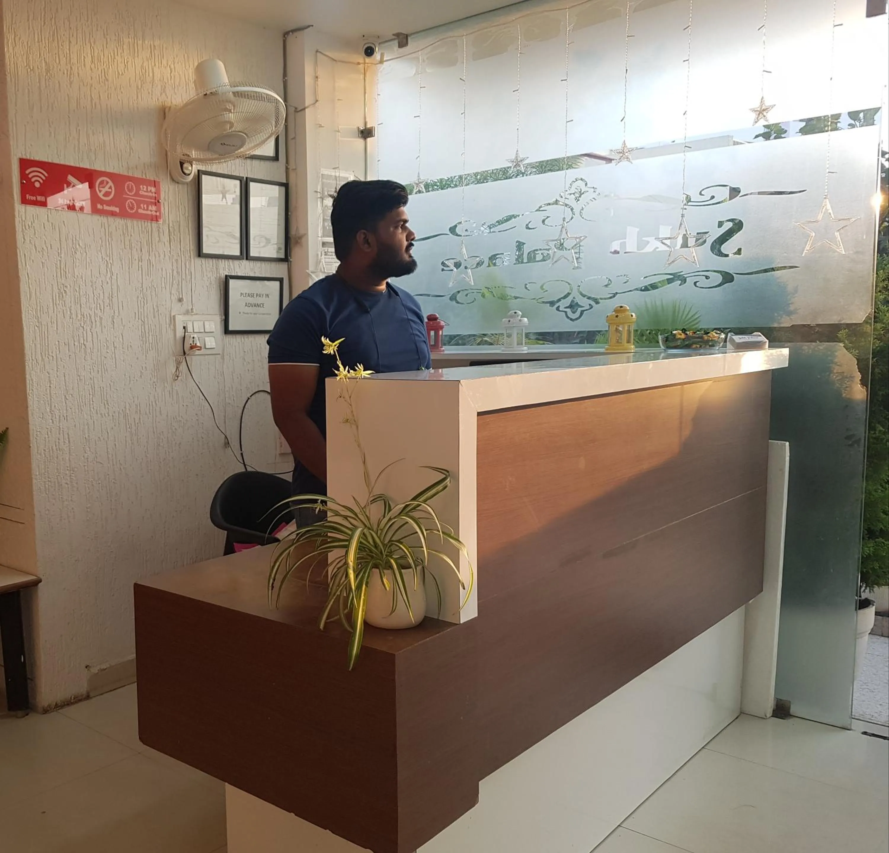 Text overlay in SUKH PALACE