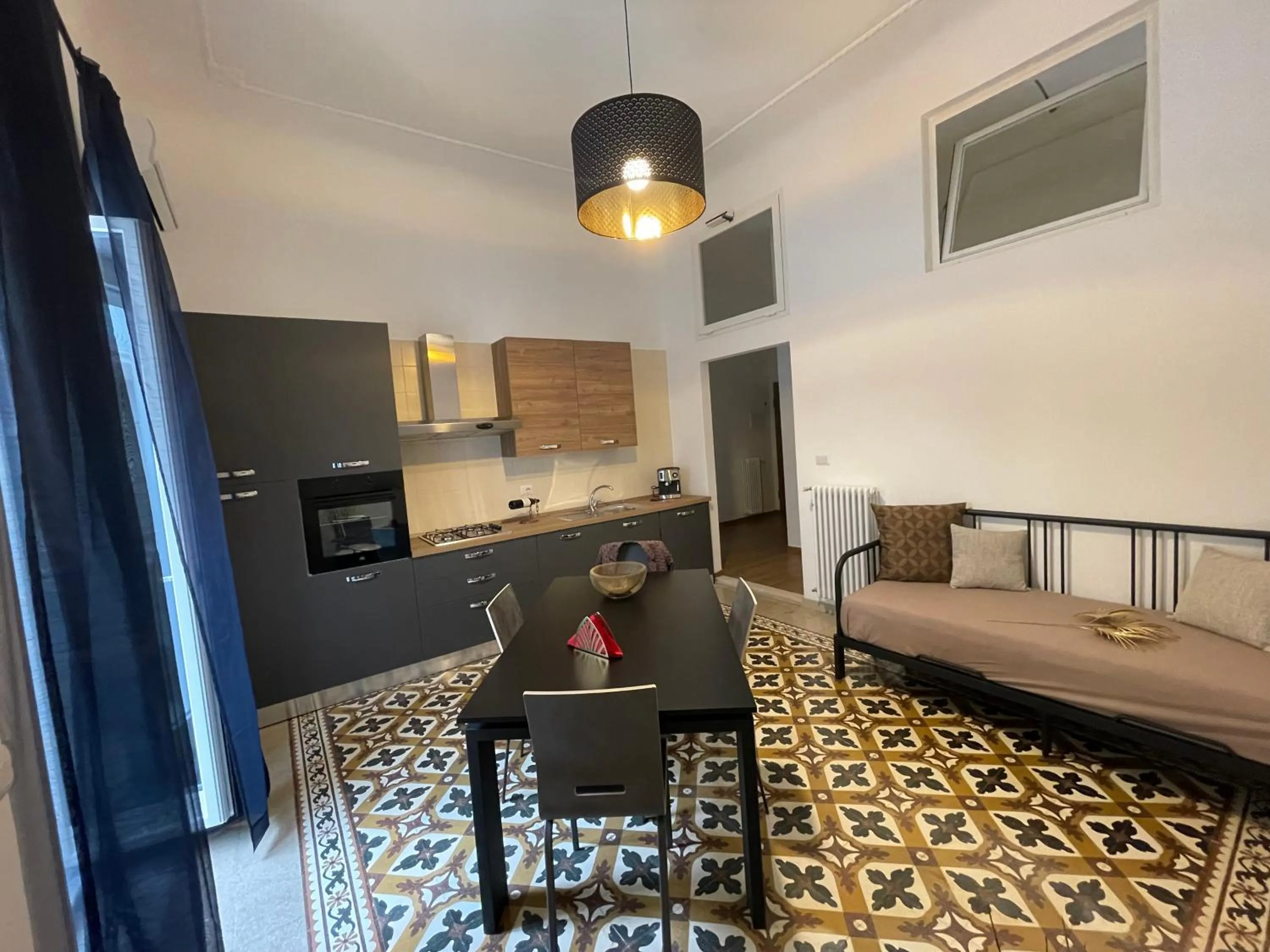 Kitchen or kitchenette in Maioliche Apartment