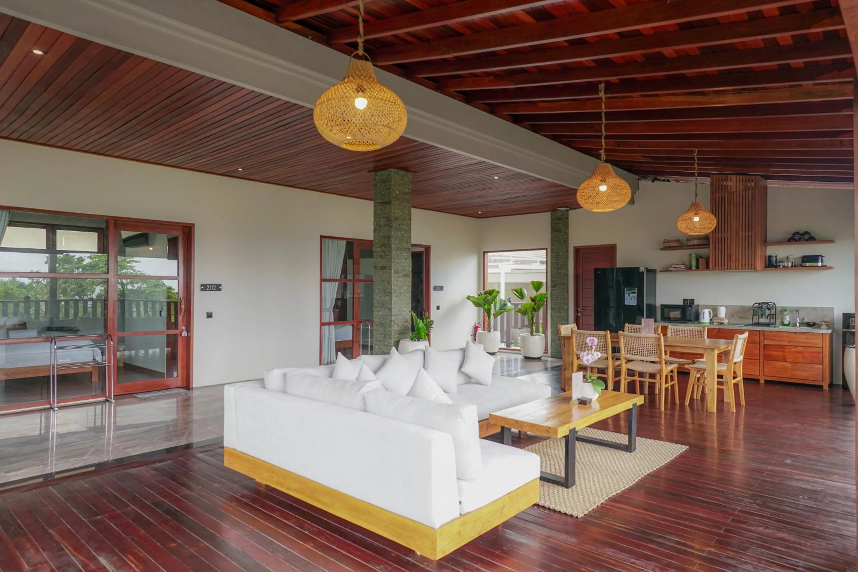 Communal lounge/ TV room in Tropical Beach House Bali