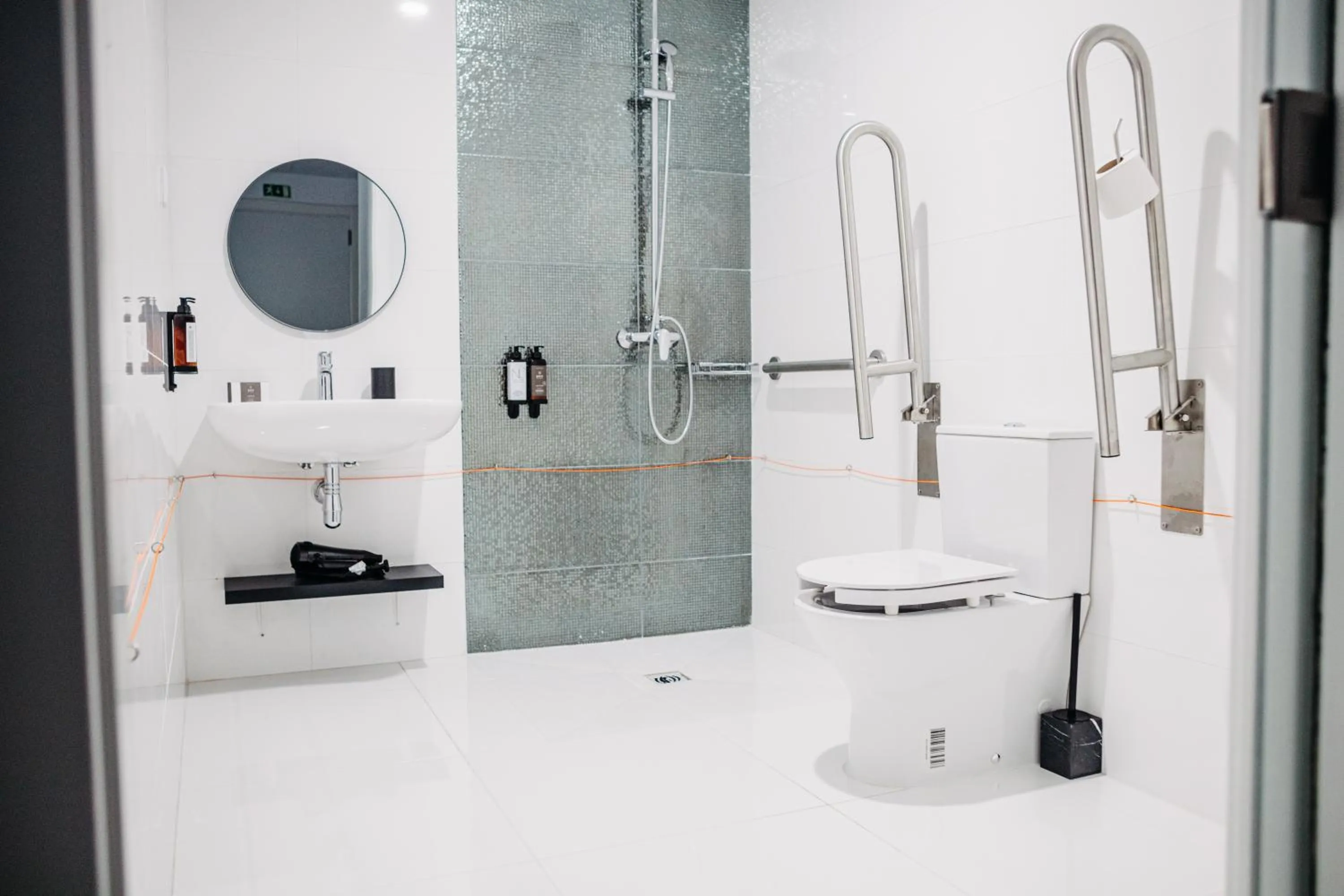 Toilet in Next Level Premium Hotels