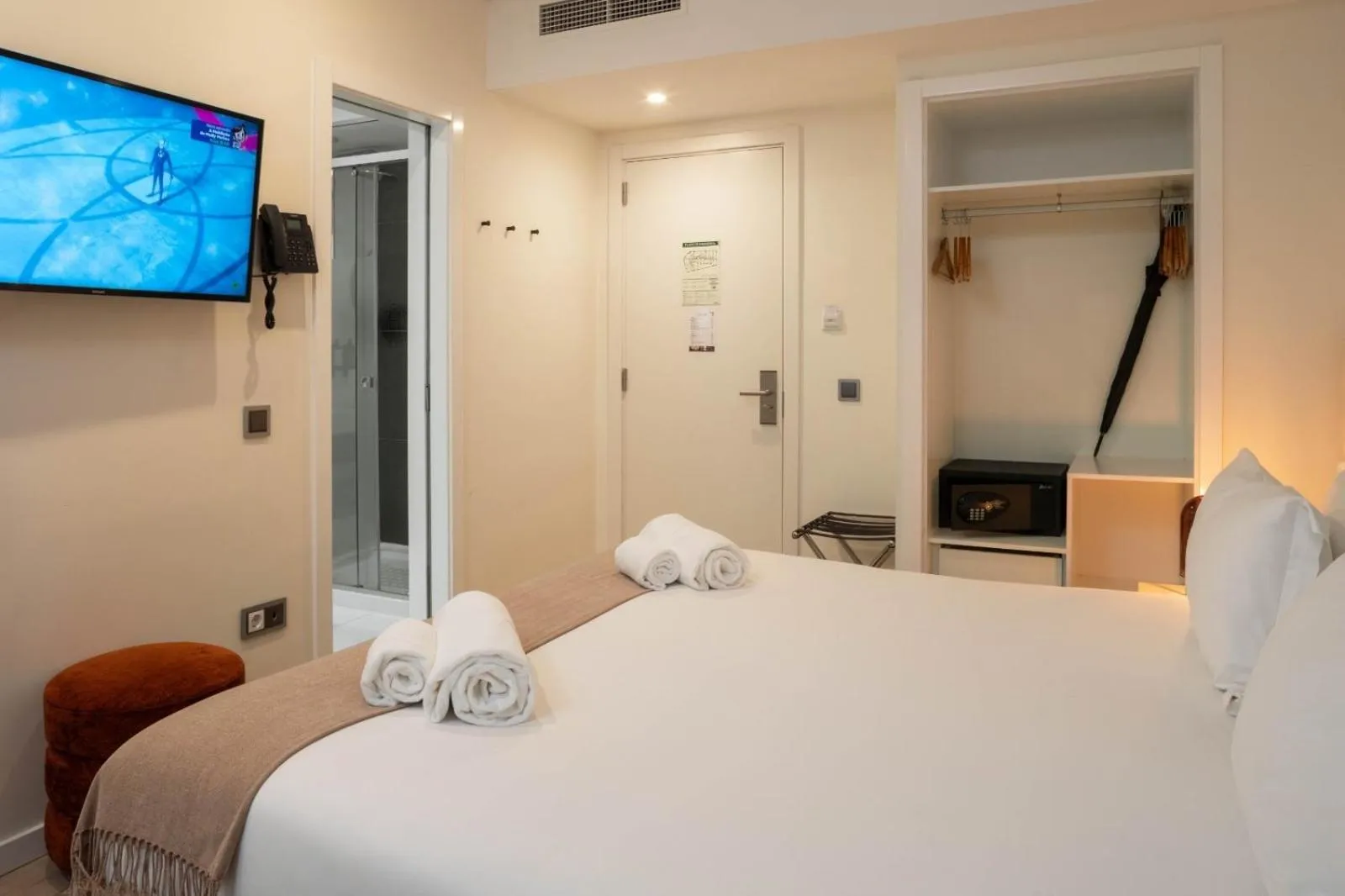 Bed in Next Level Premium Hotels