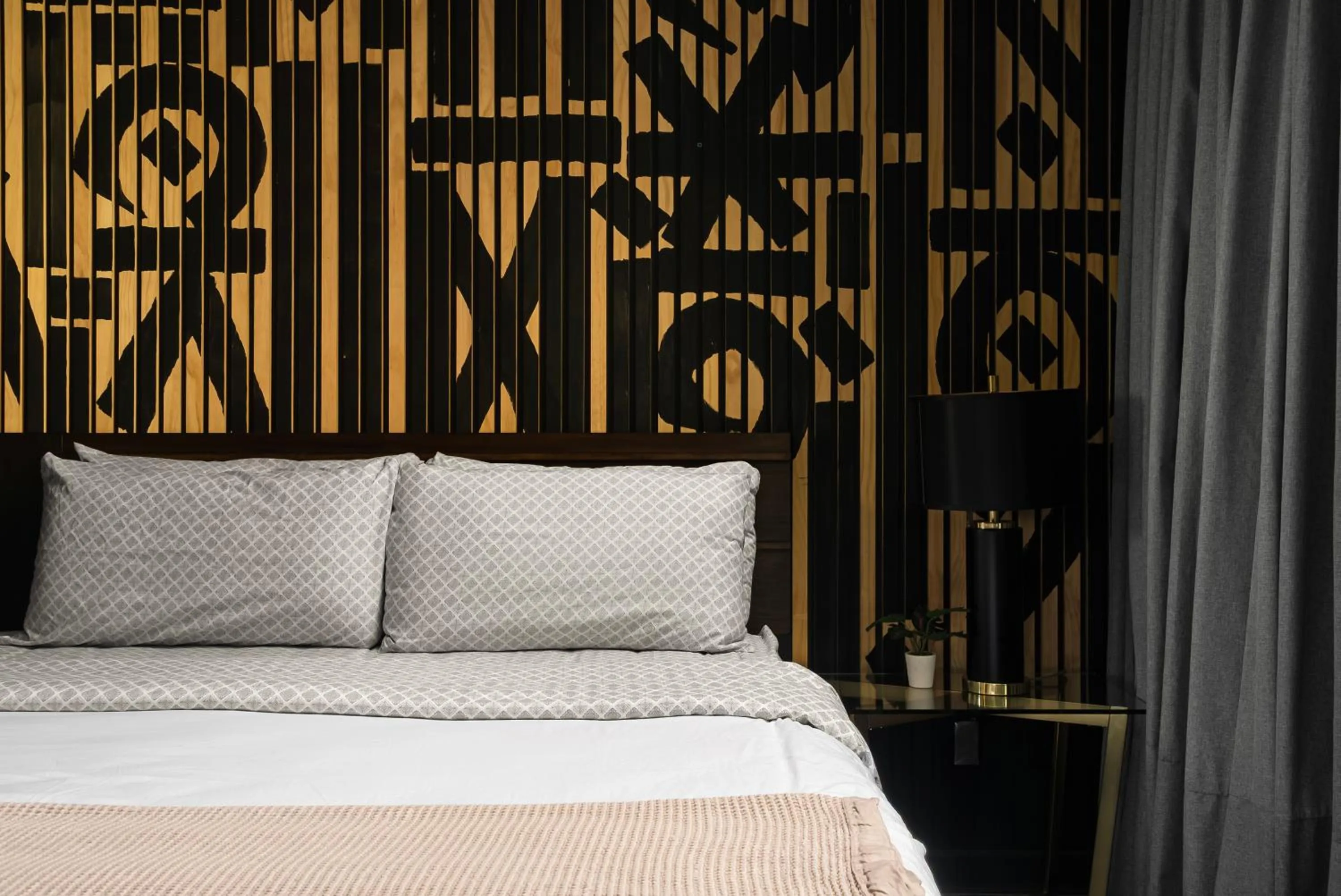 Bed in Audemar Boutique Hotel and Apartment Homes