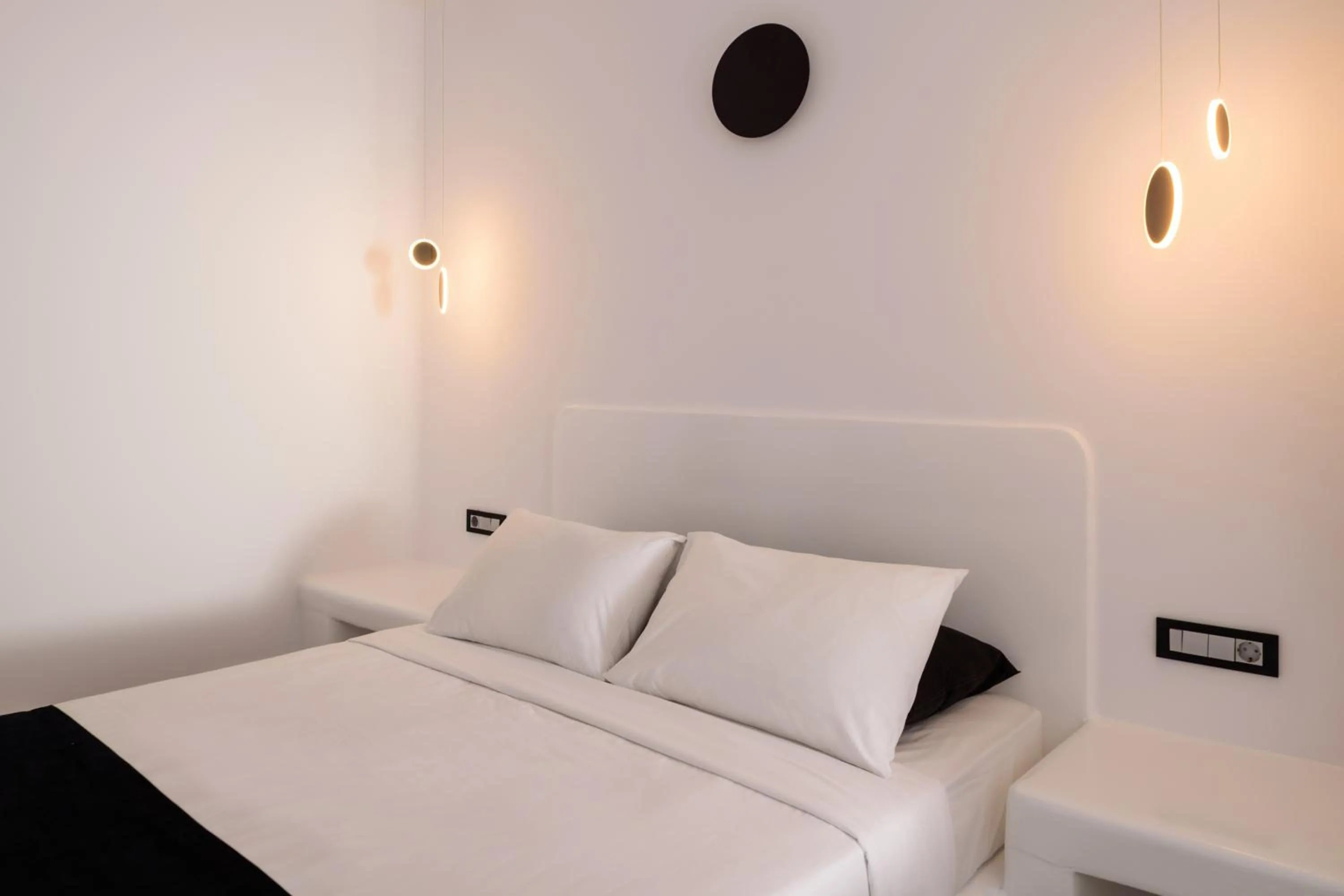 Bed in Tataki Family Hotel