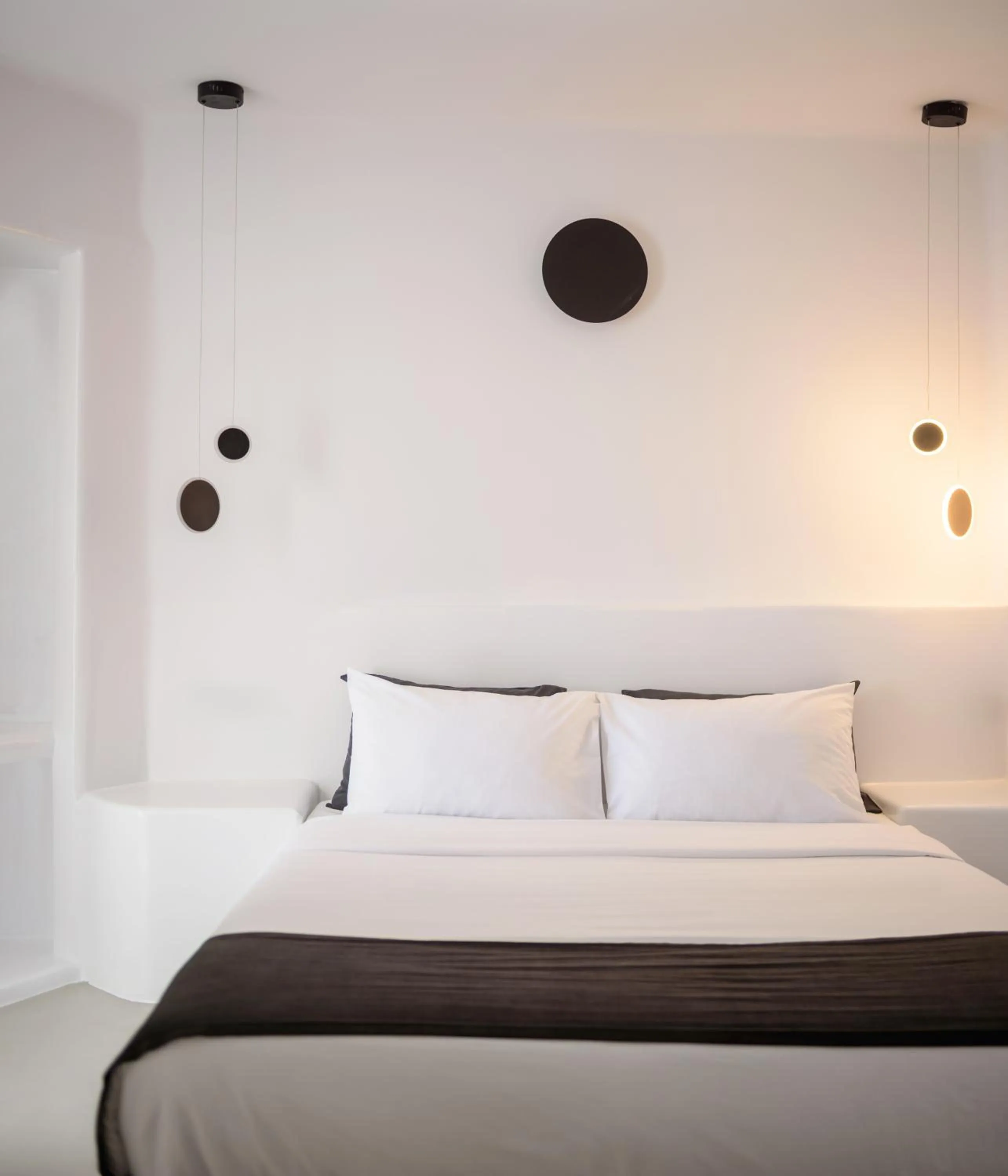 Bed in Tataki Family Hotel