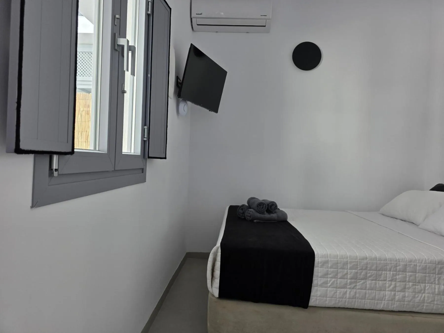 Bed in Tataki Family Hotel