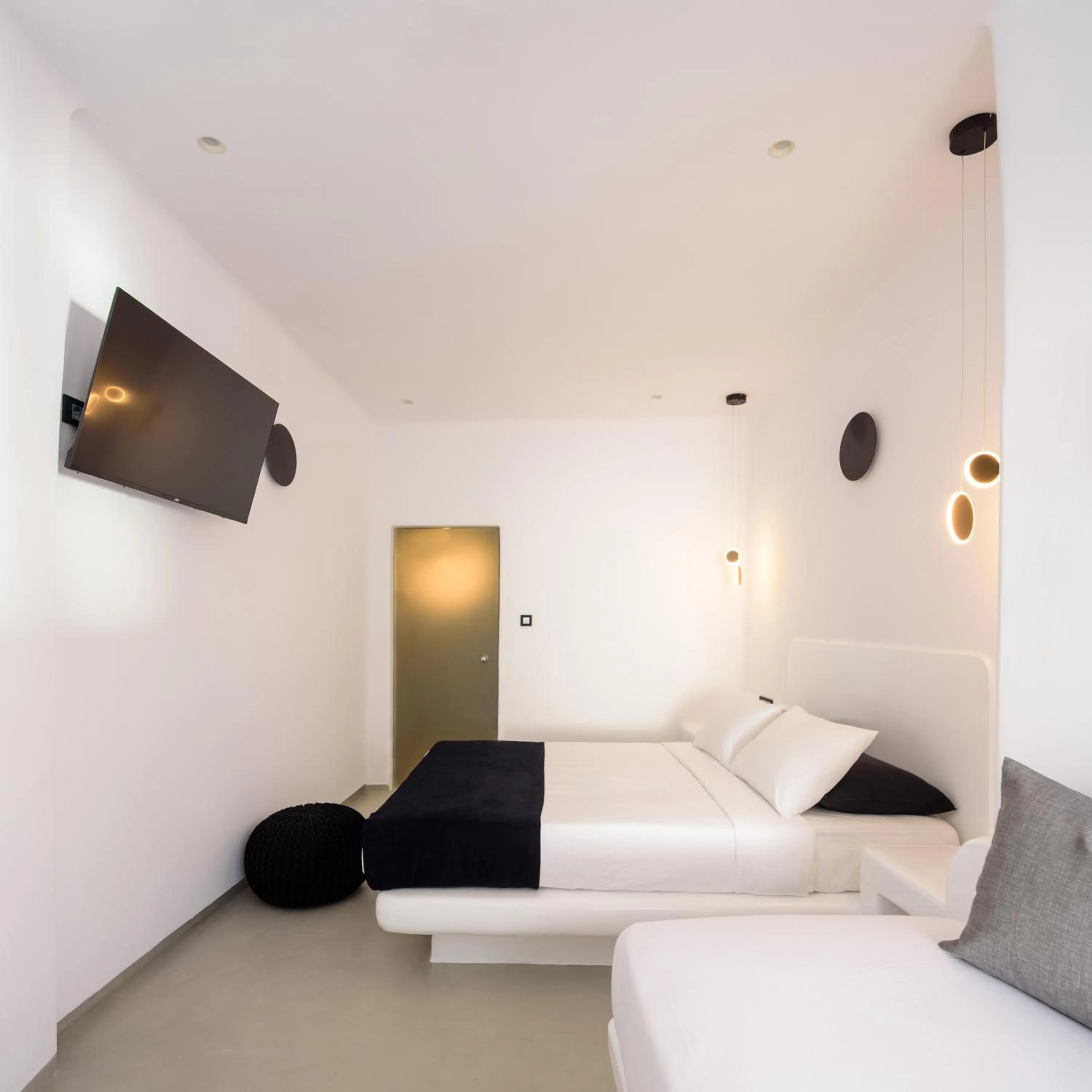 Bed in Tataki Family Hotel