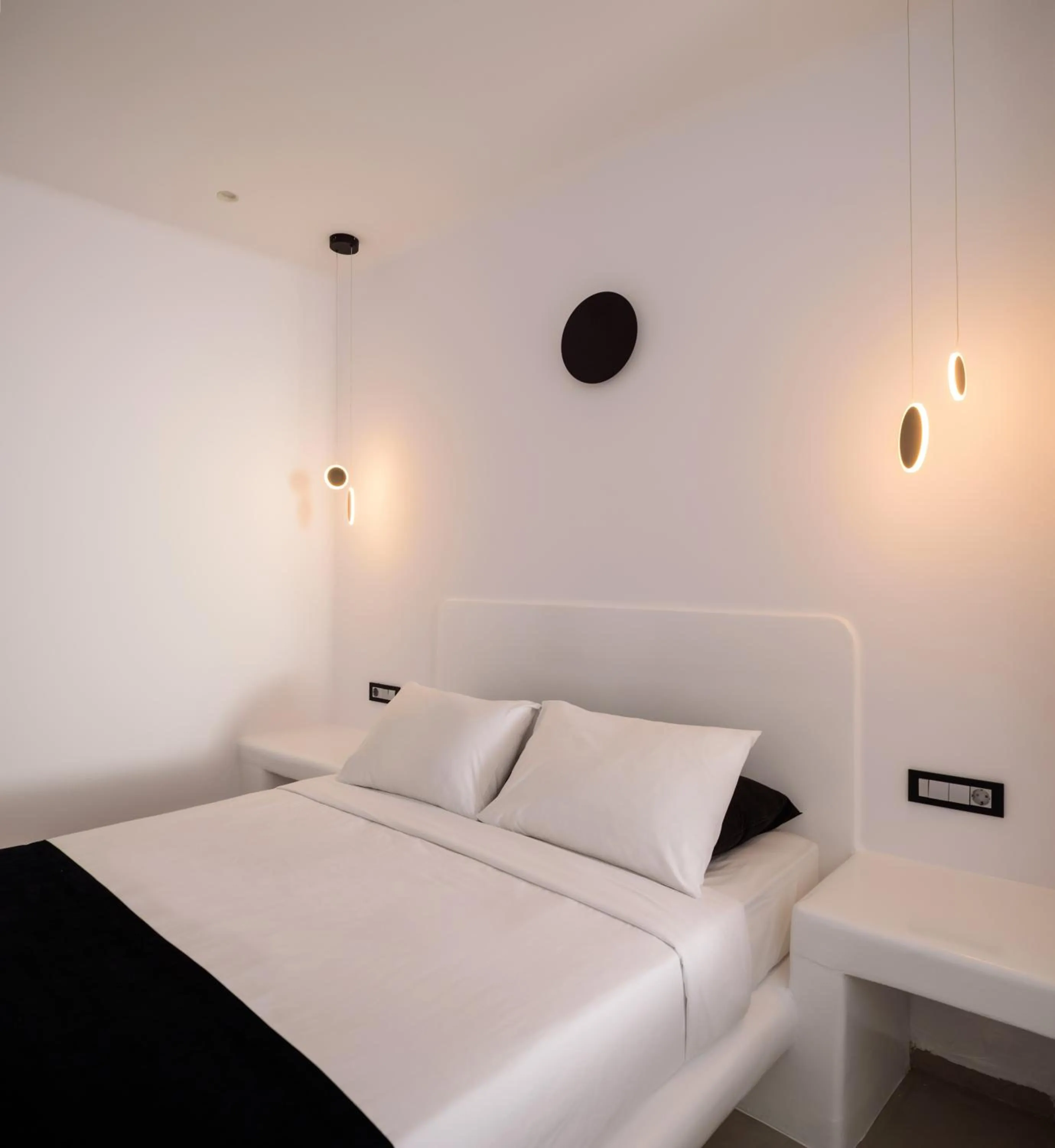 Bed in Tataki Family Hotel