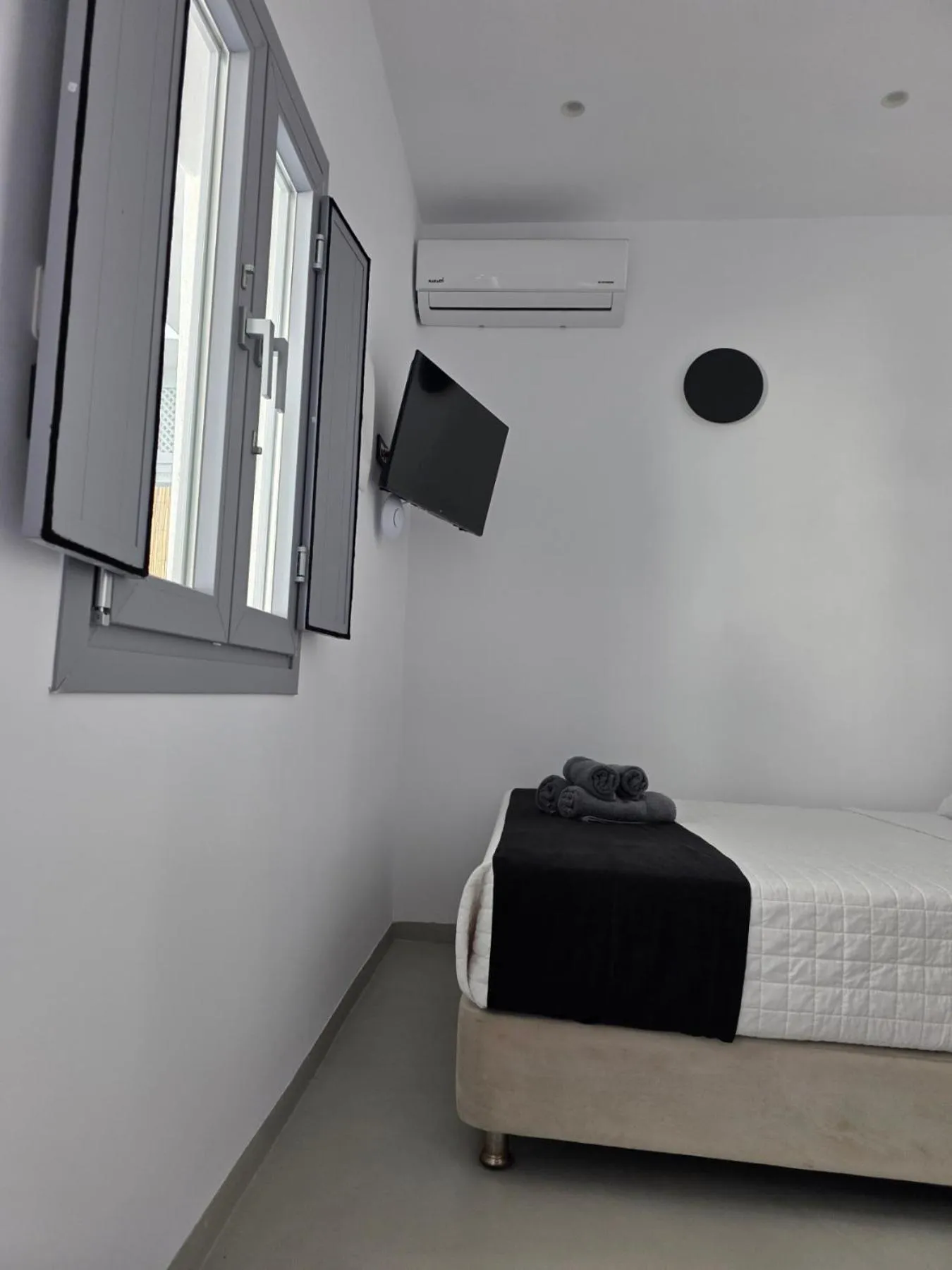 Bed in Tataki Family Hotel