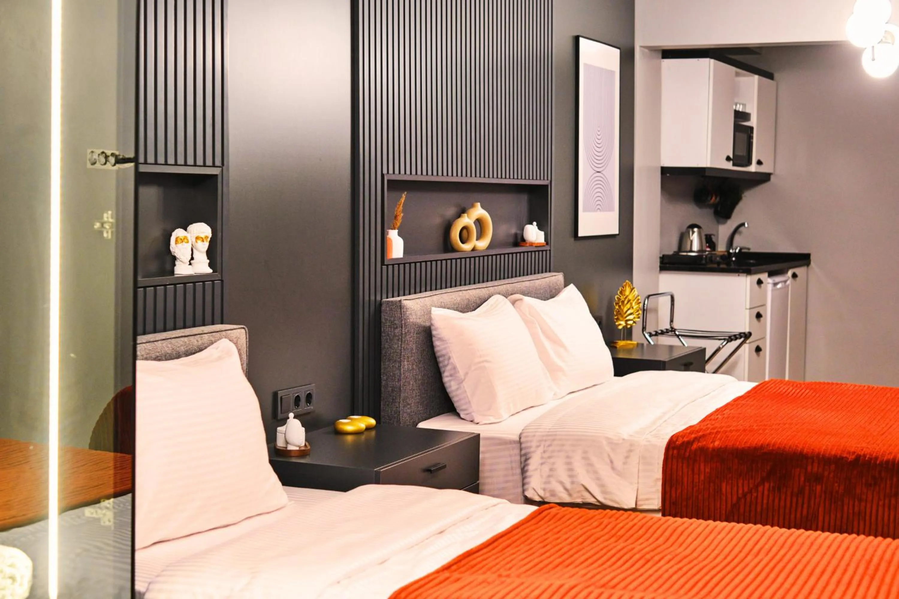 Bed in TAKS-INN Hotel