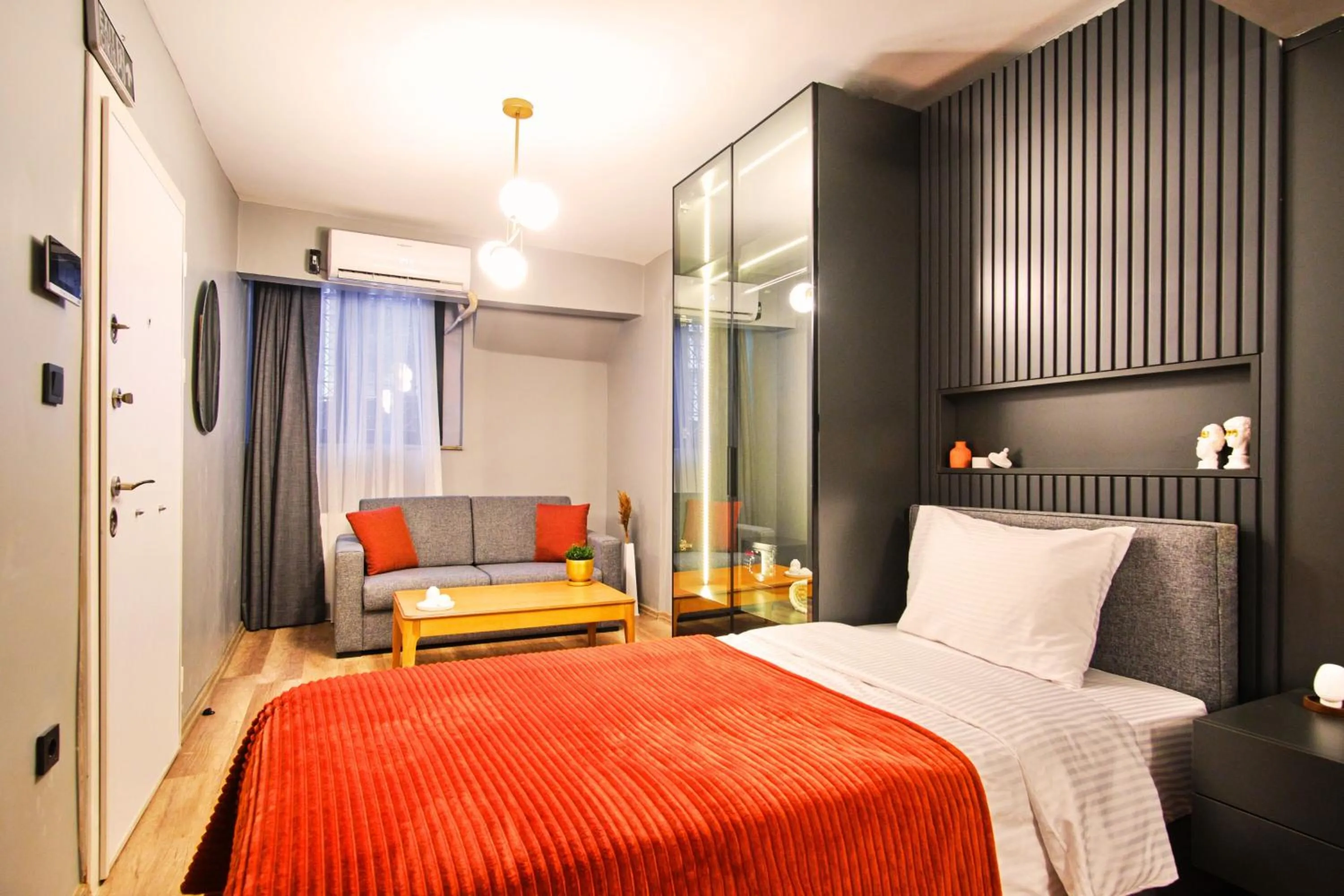 Bed in TAKS-INN Hotel