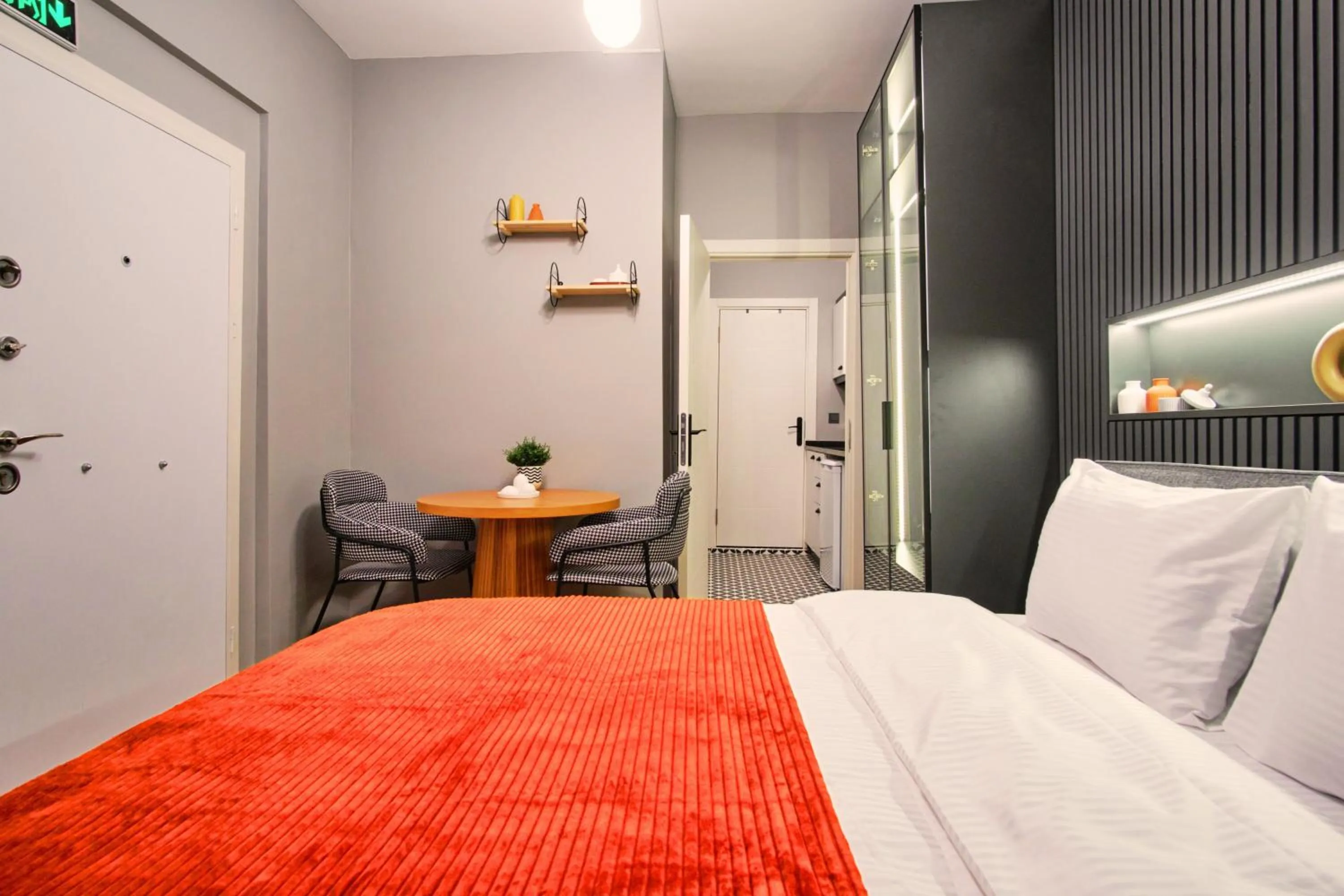 Bed in TAKS-INN Hotel