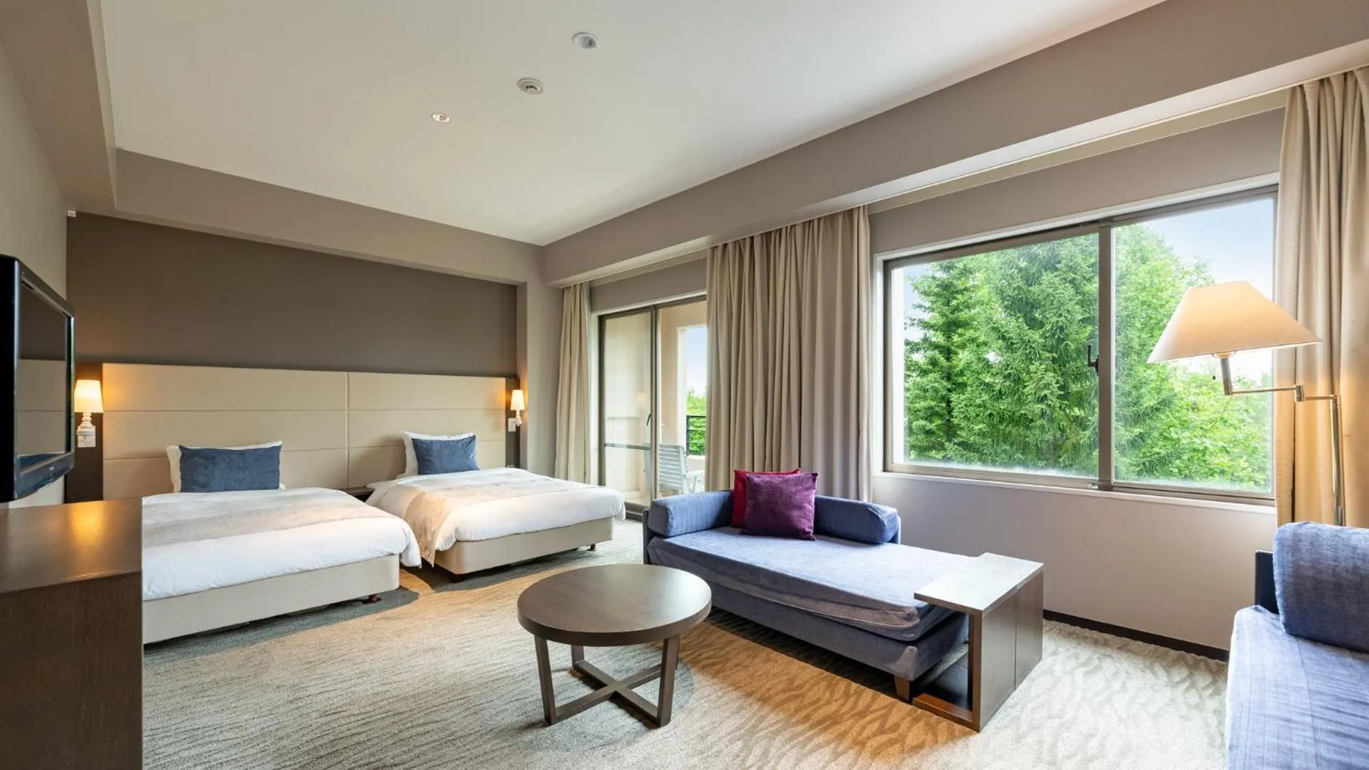 Bed in EN RESORT Grandeco Hotel