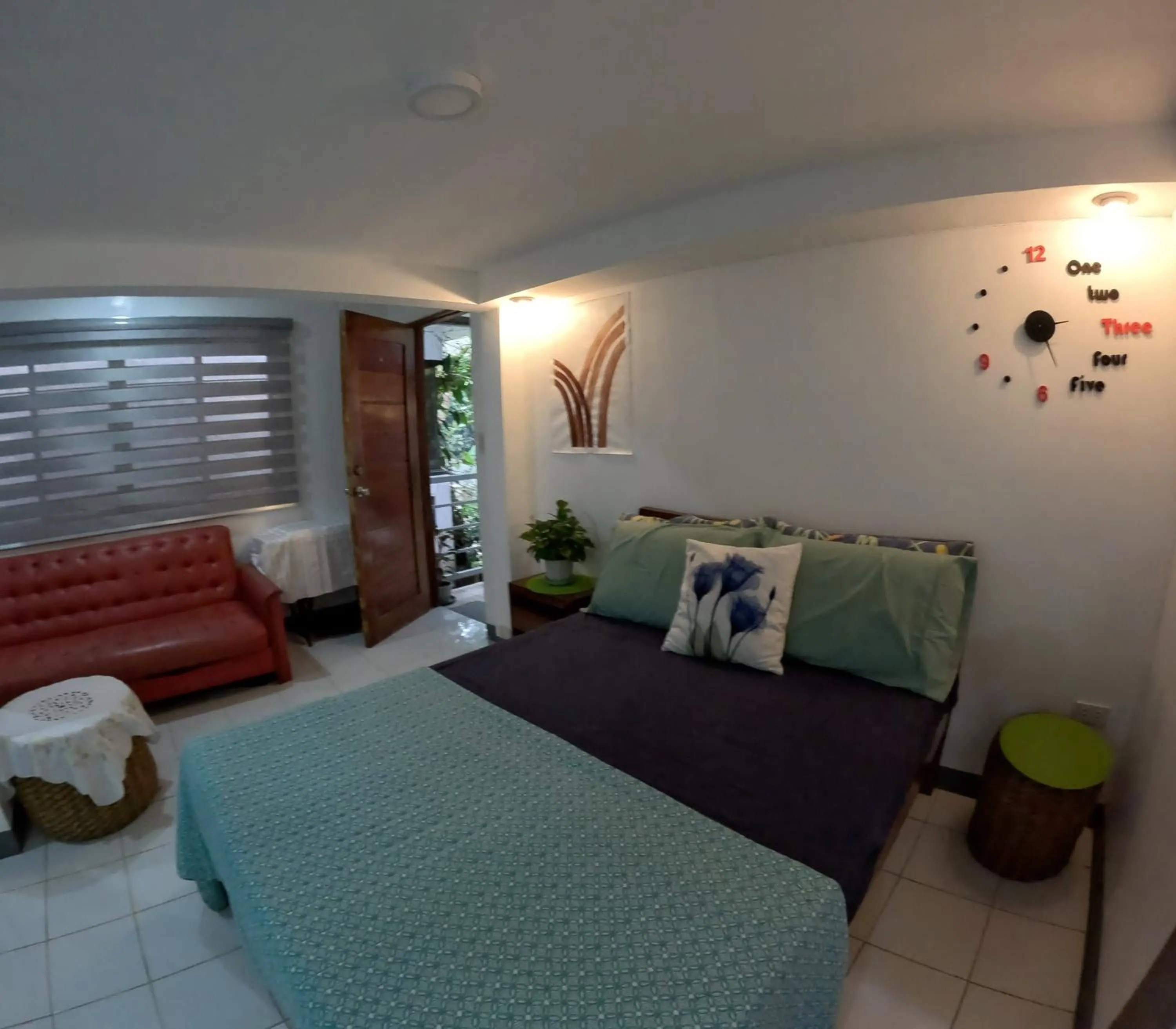 Photo of the whole room, Bed in Auntie Gigi's Place