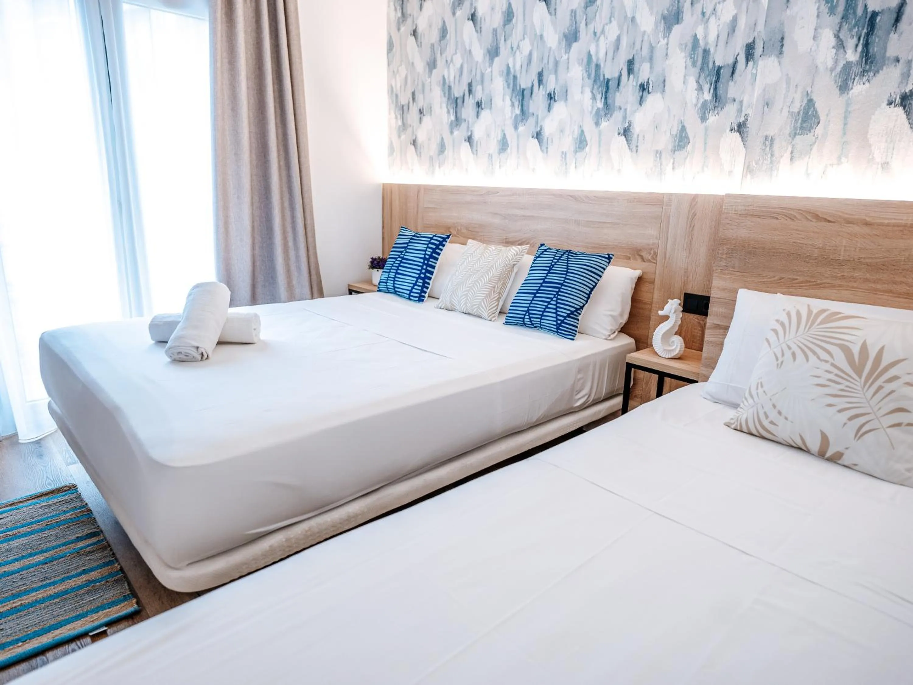 Bed in Sweet Lloret Suites