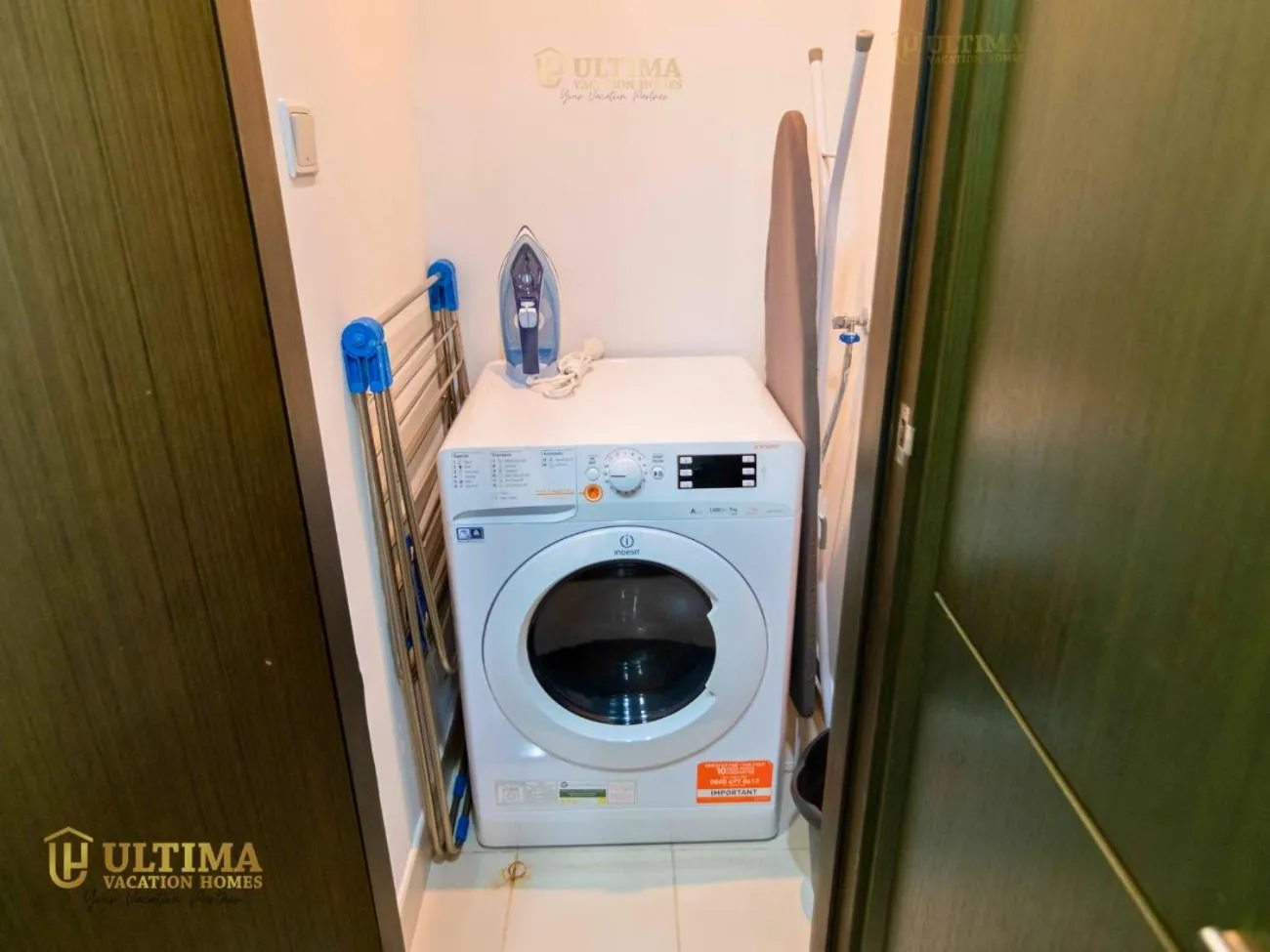 washing machine in Close to Dubai Mall -Dazzling 1BR in Loft West