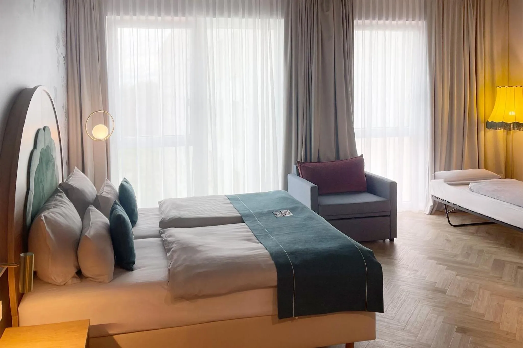 Photo of the whole room, Bed in Holiday Inn - the niu, Flower Konstanz by IHG