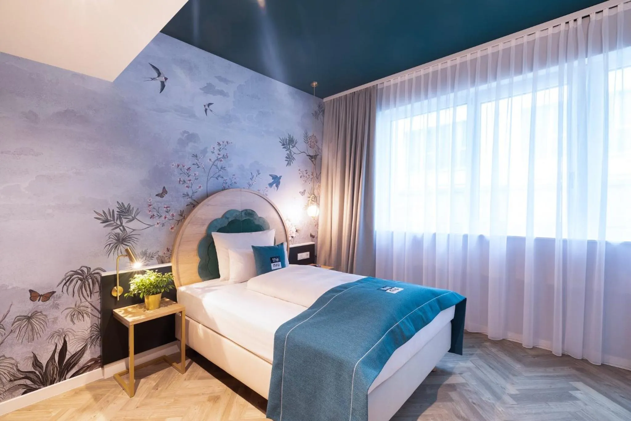 Photo of the whole room, Bed in Holiday Inn - the niu, Flower Konstanz by IHG