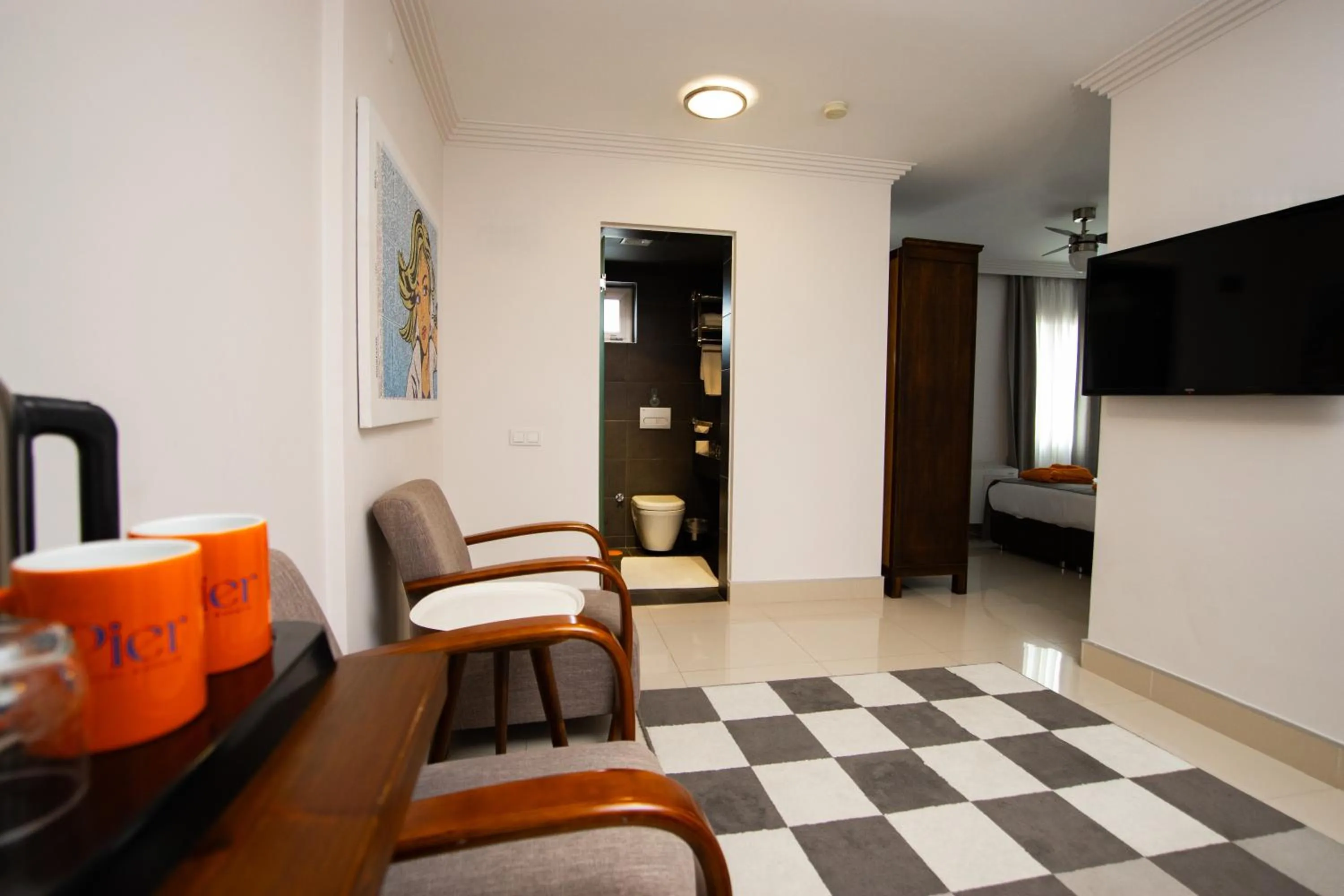 Communal lounge/ TV room in Hotel Pier Bodrum Marina