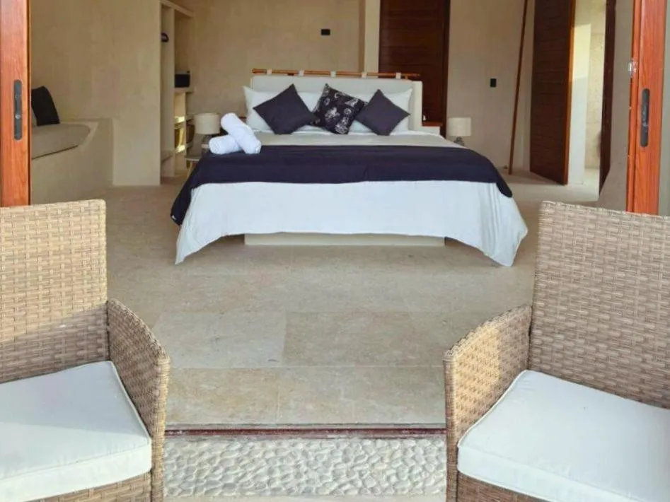 Bed in DK Luxury Ocean Front Villa - Adults Only