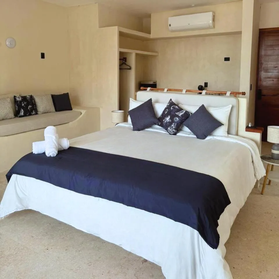 Bed in DK Luxury Ocean Front Villa - Adults Only