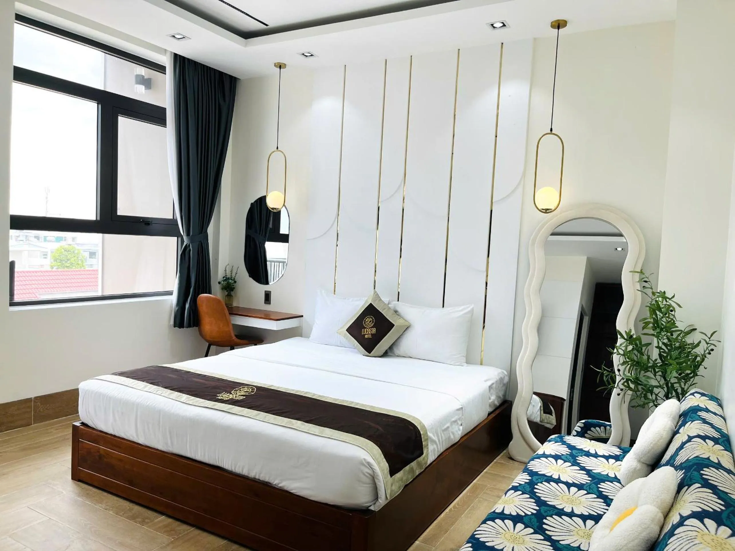 Bed in Lucasta Hotel