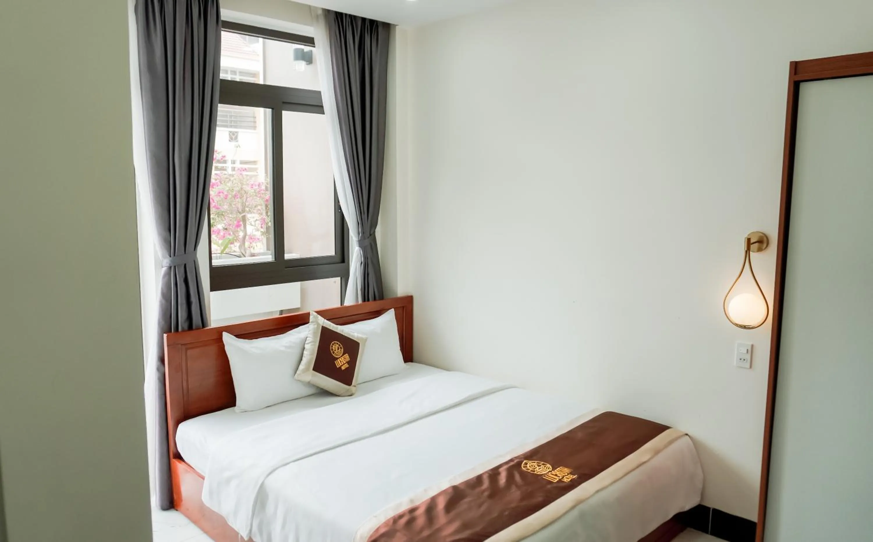 Bed in Lucasta Hotel