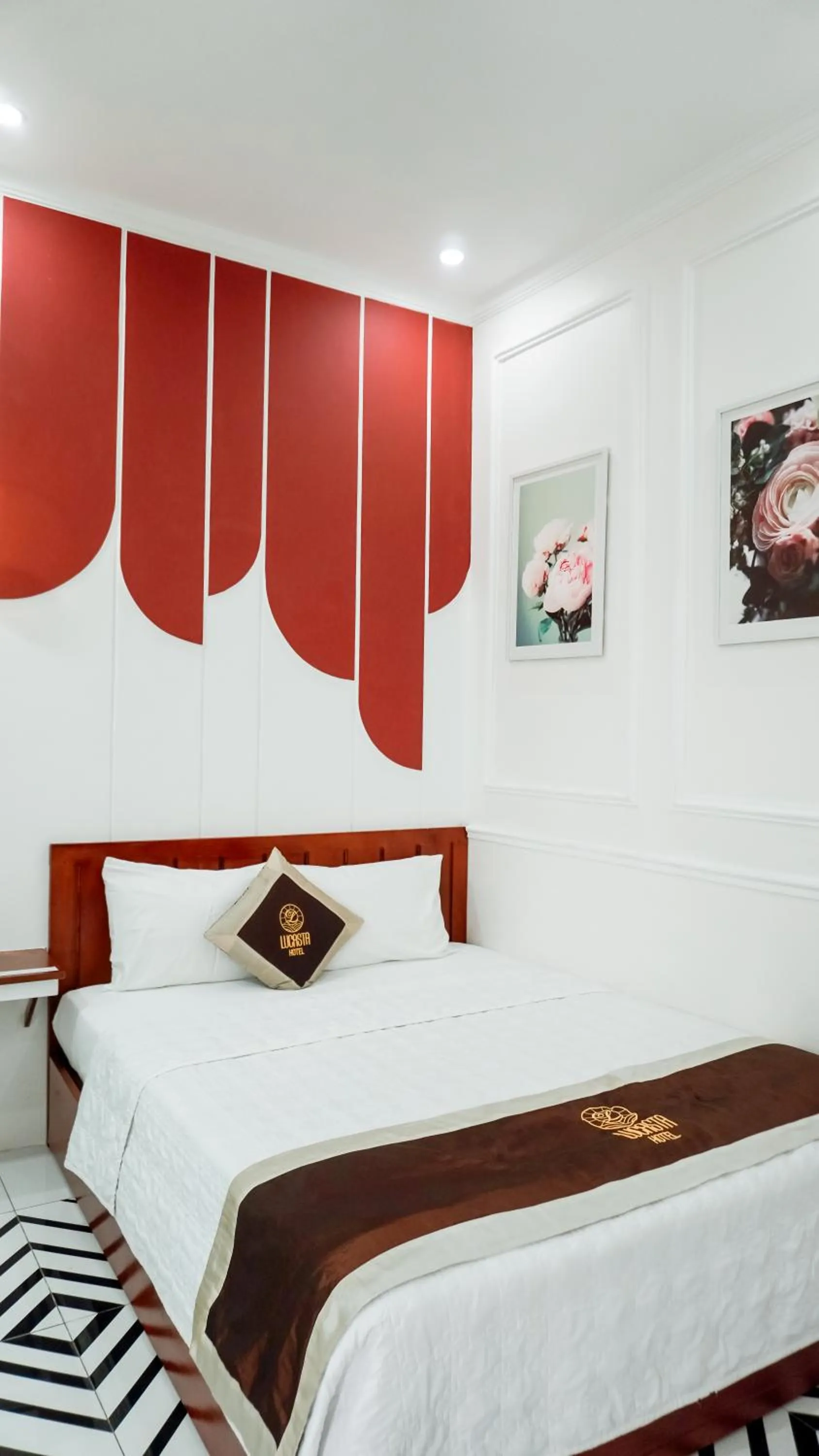 Bed in Lucasta Hotel