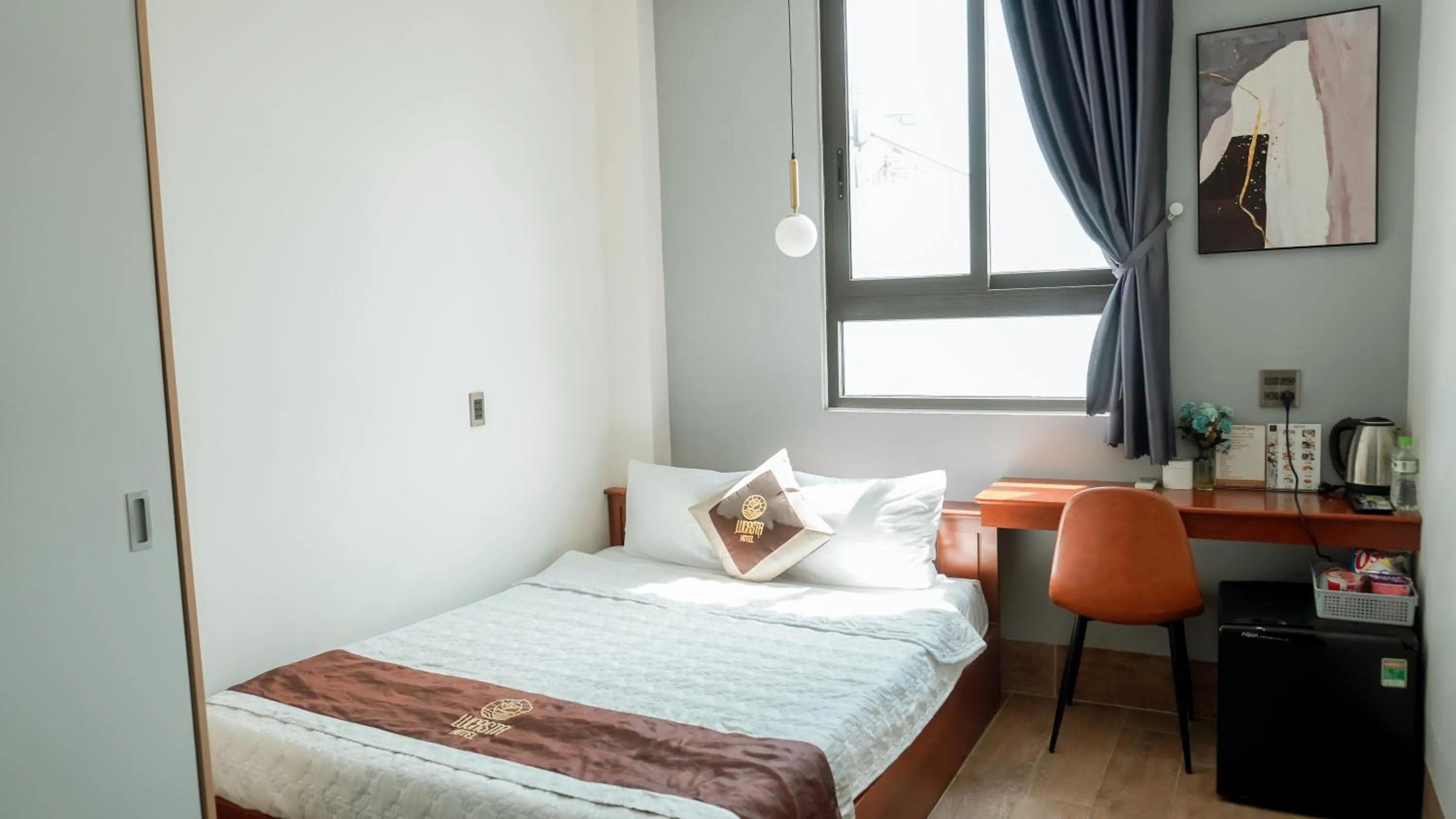 Bed in Lucasta Hotel