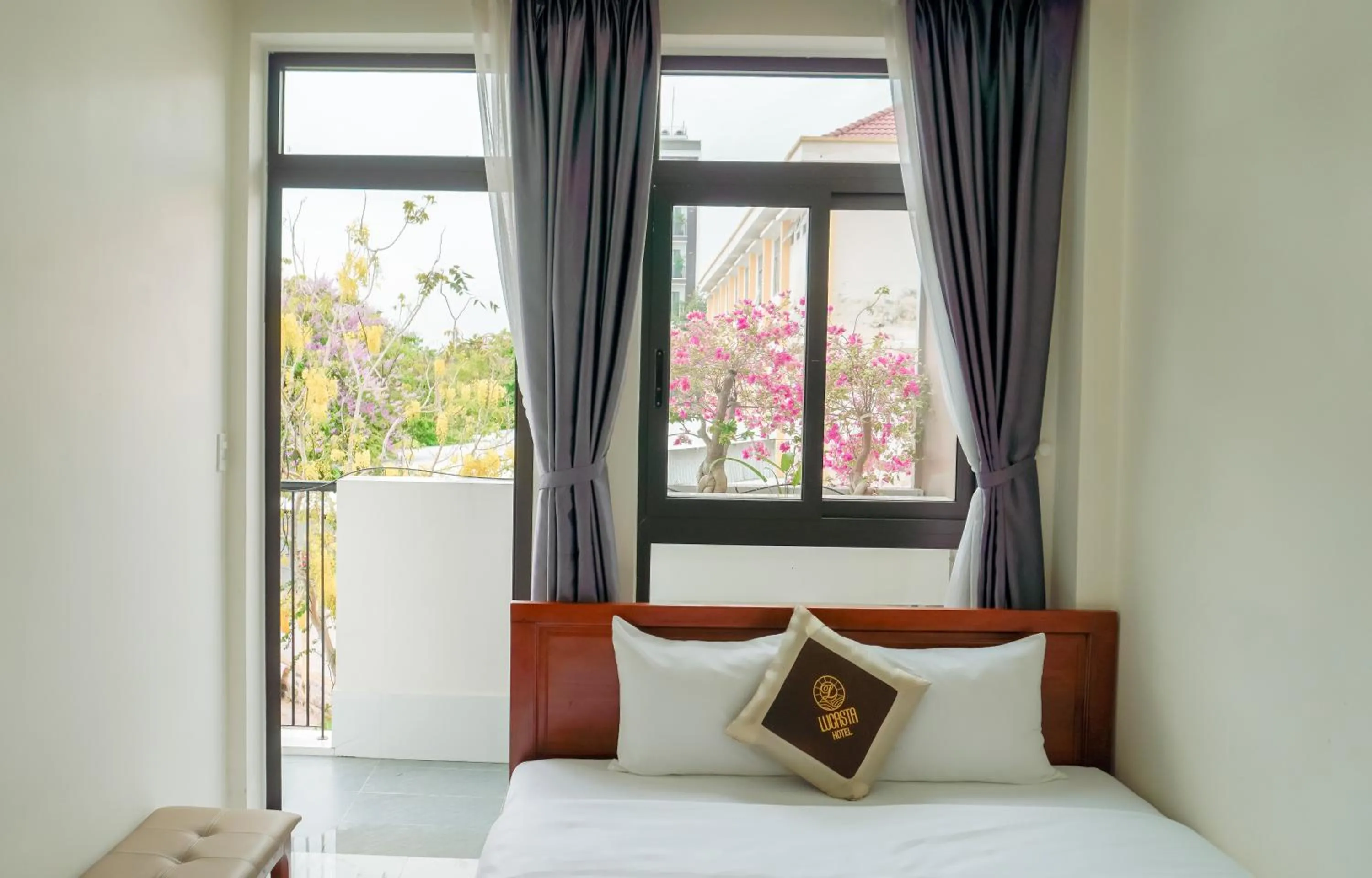 Bed in Lucasta Hotel