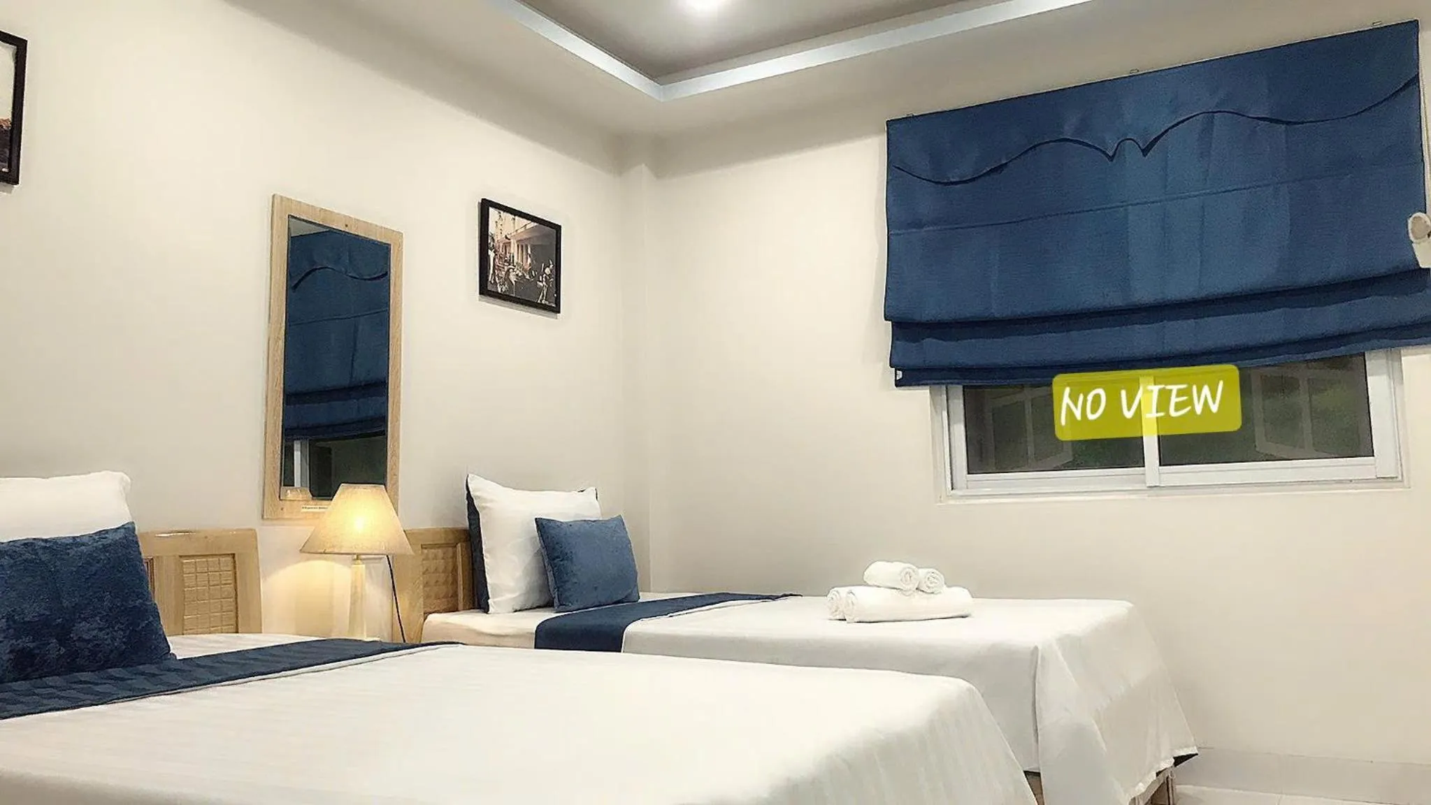 Photo of the whole room, Bed in Hanoi Holiday Hotel