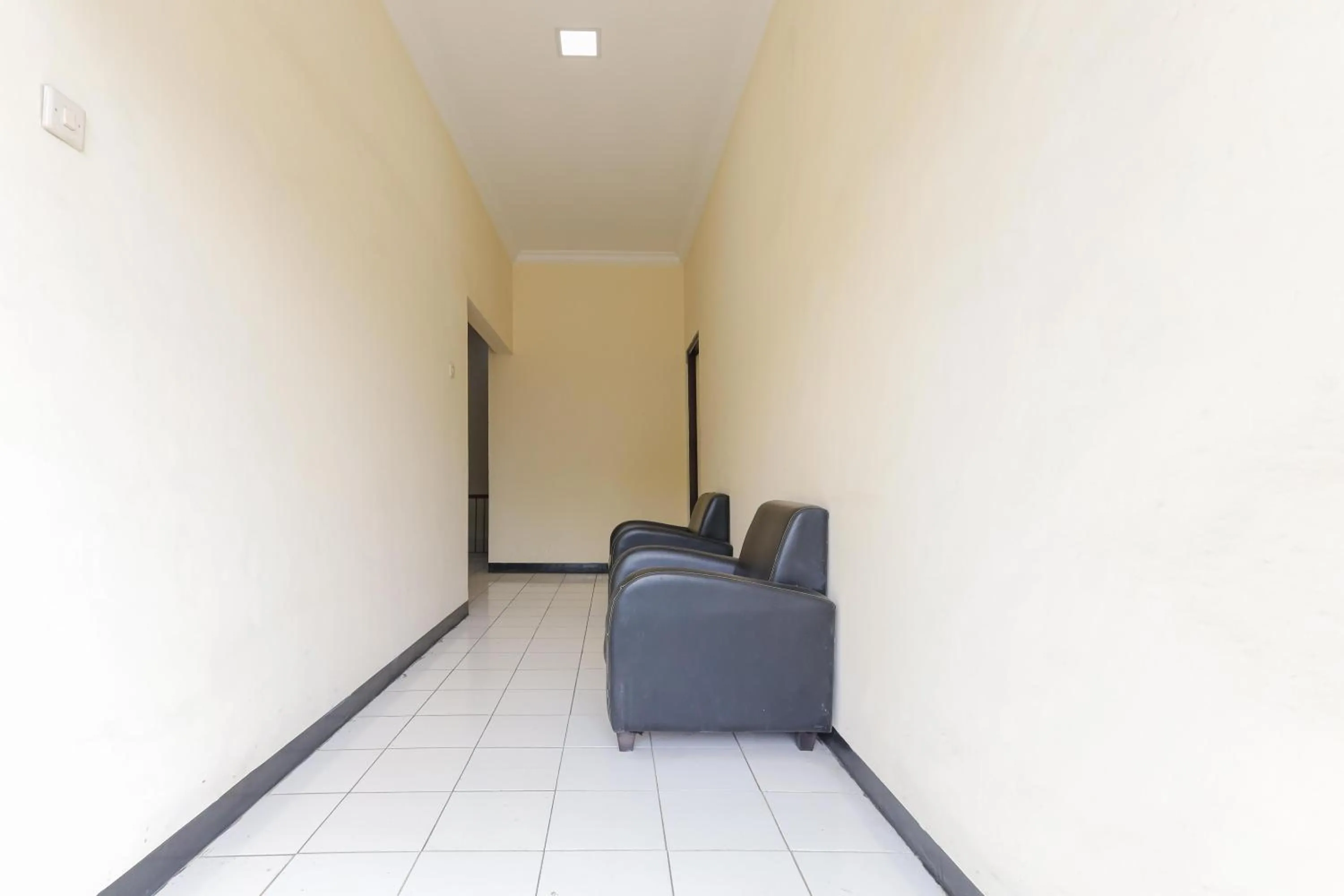 Living room in Urbanview Roemah Tebet by RedDoorz