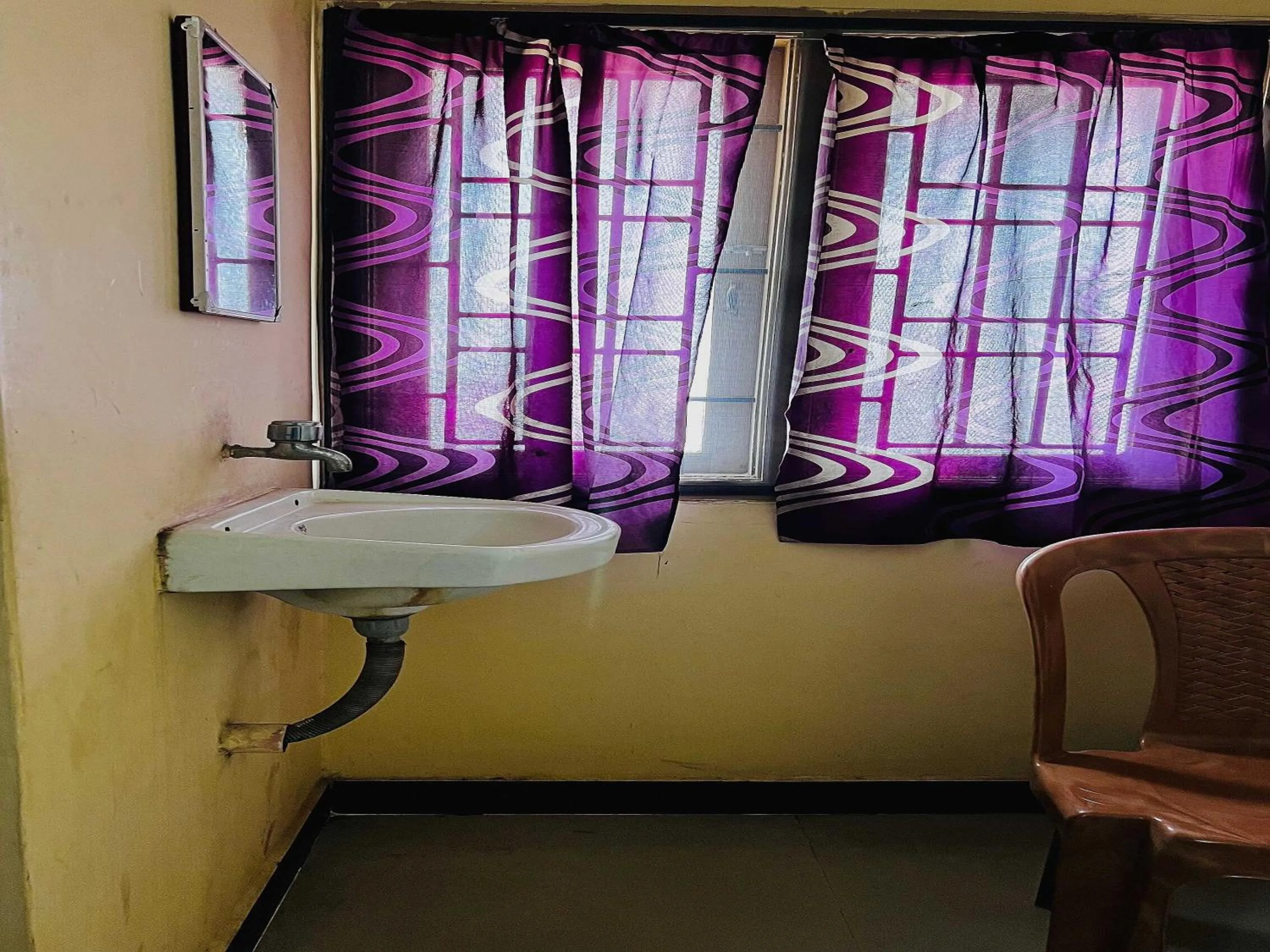 Bedroom in Hotel O 81239 Shri Vinayaka Inn Rooms