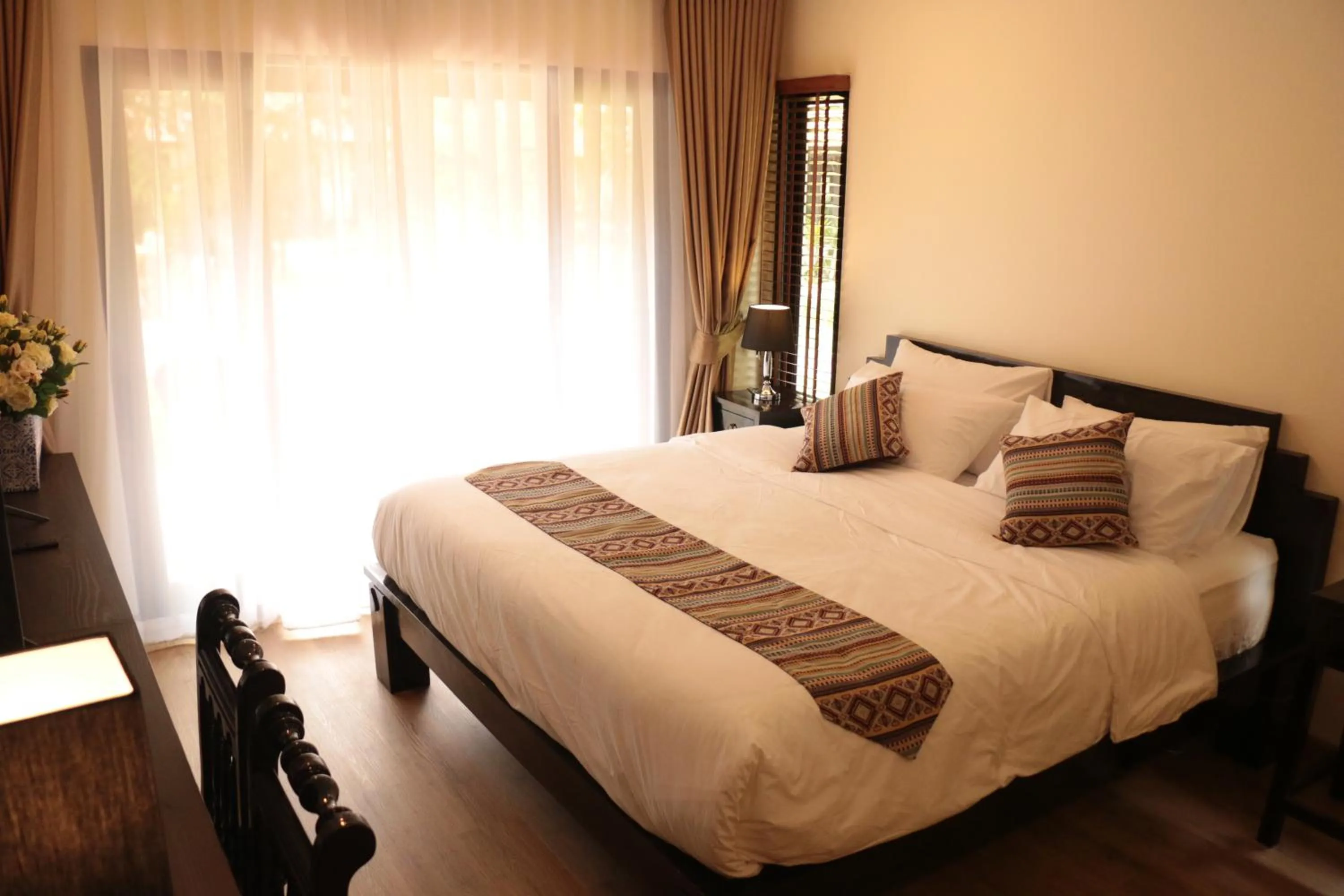 Bed in Le Baan Thai Boutique Villa
