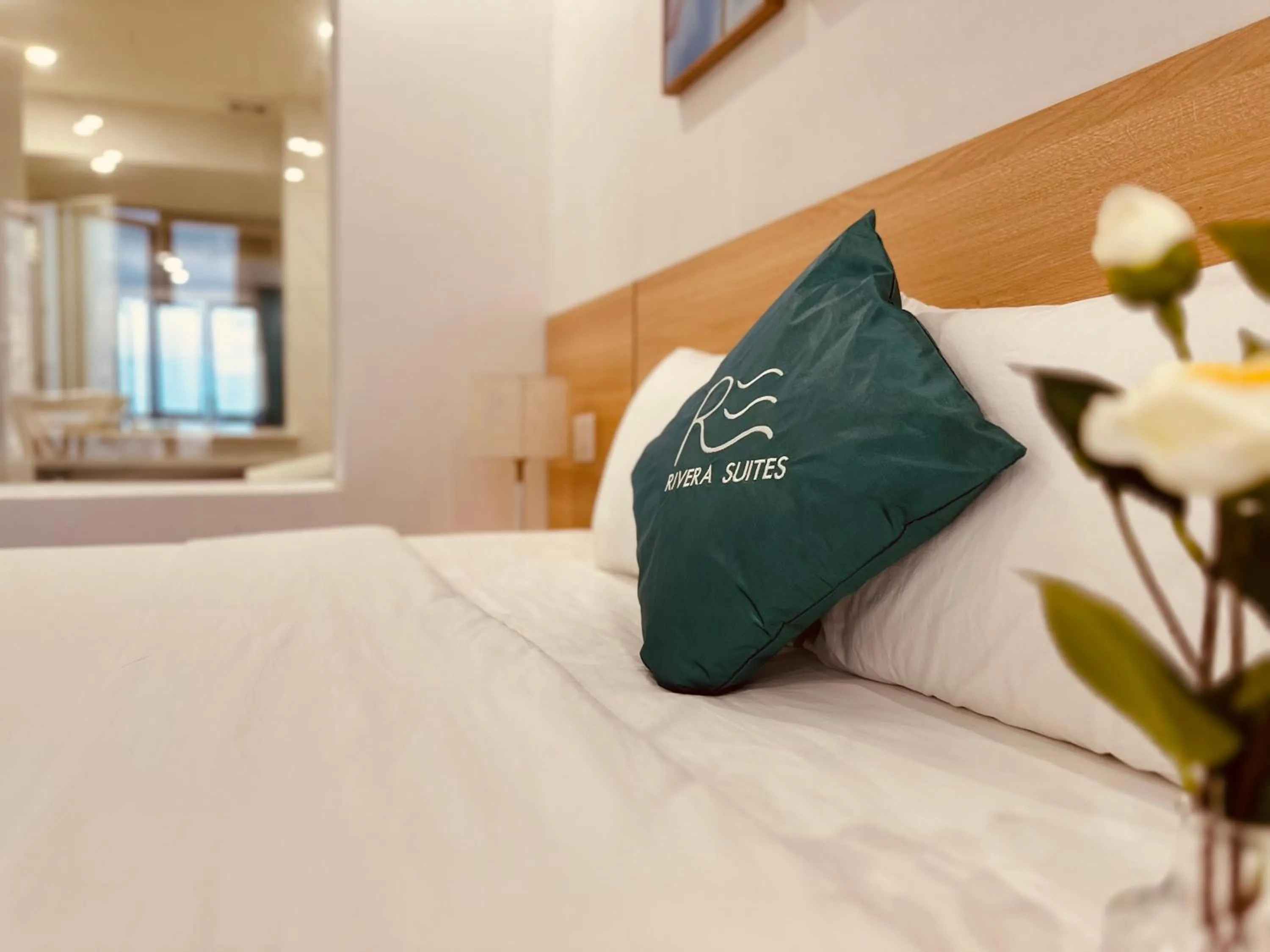 Bed in Rivera Suites