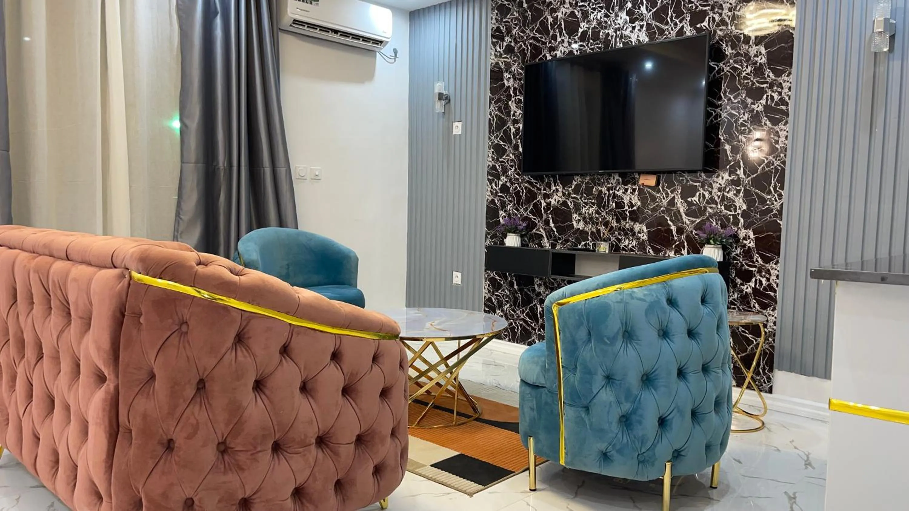 Seating area in Suna' a Home Bonapriso