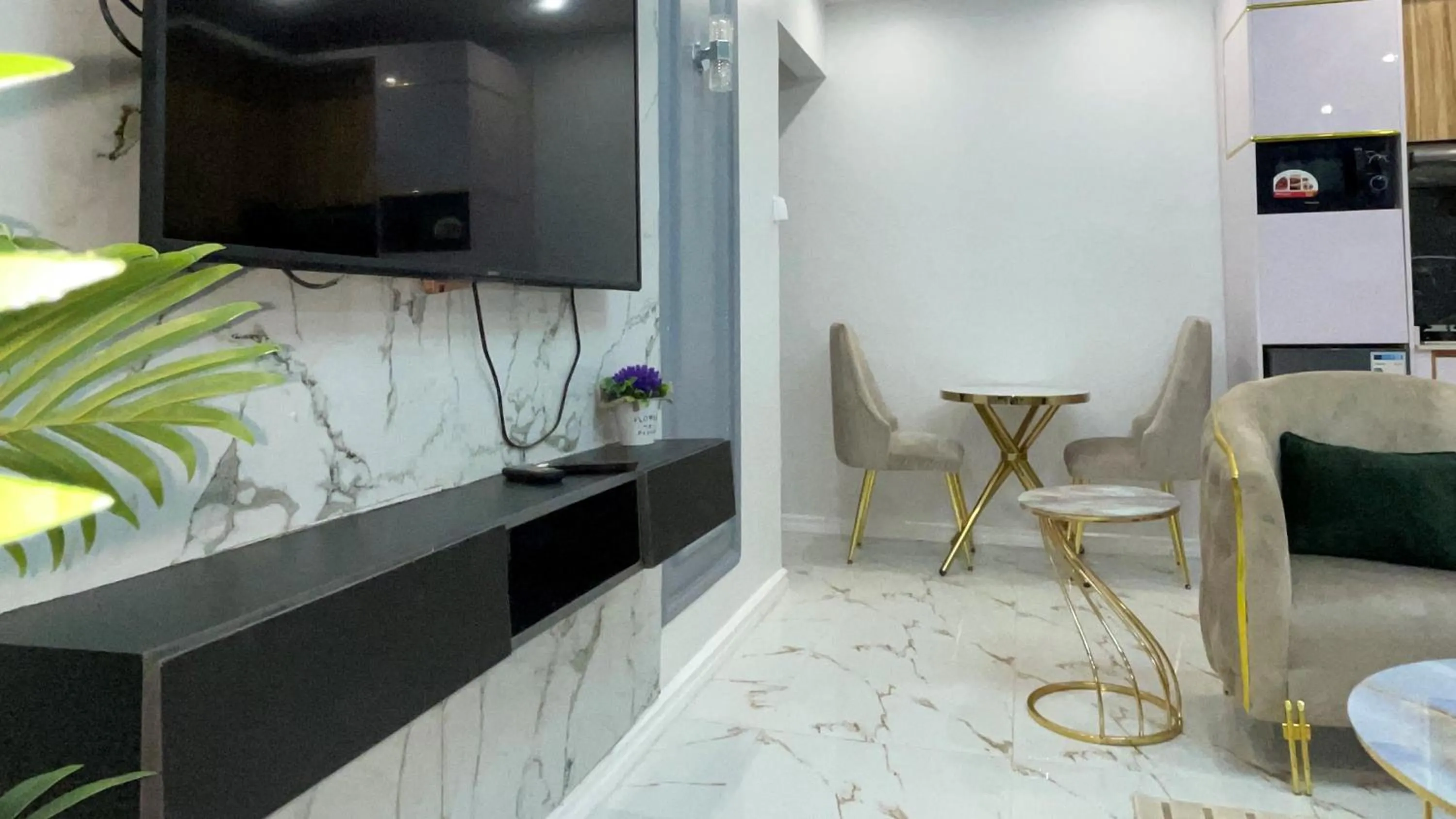 Seating area in Suna' a Home Bonapriso