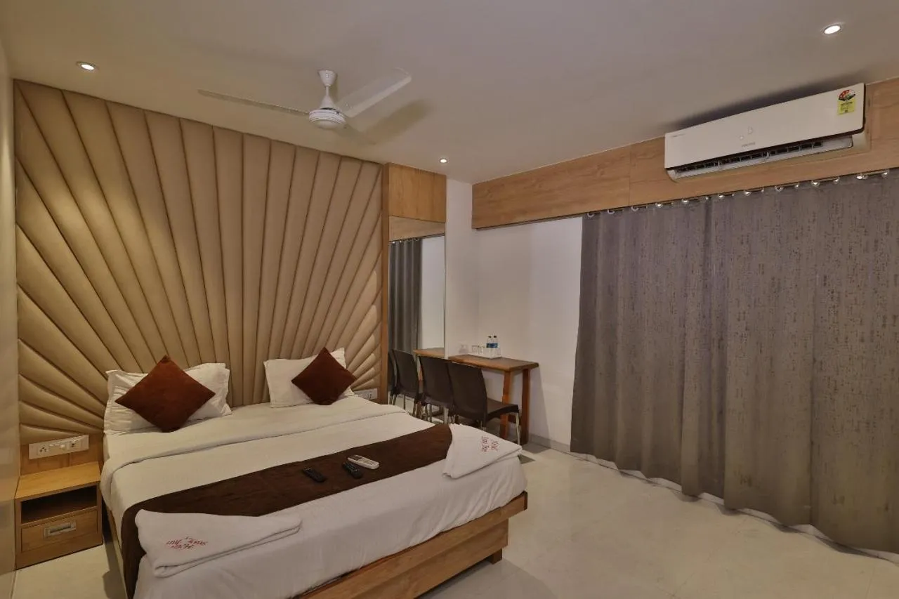 Bed in HOTEL STAY INN