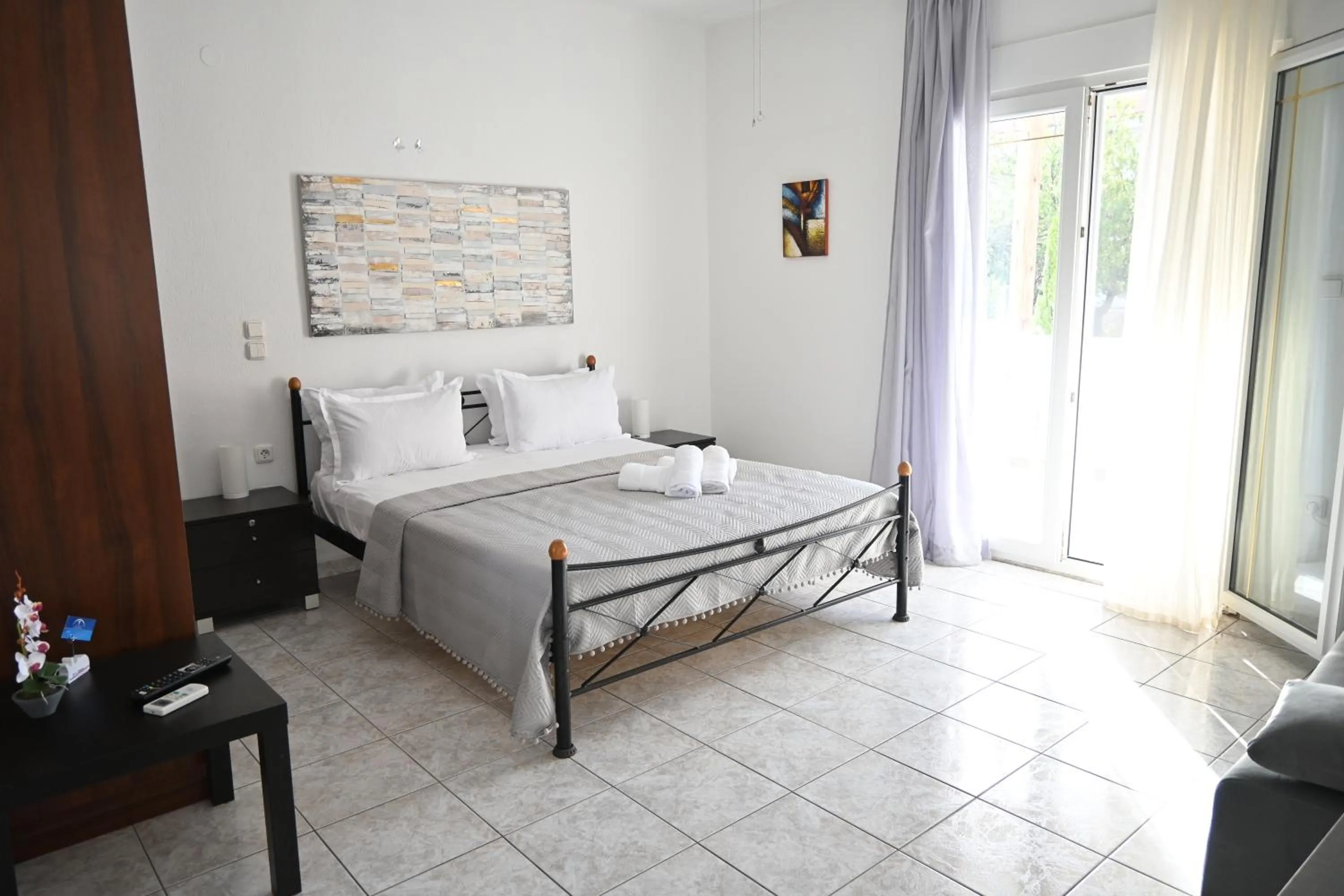 Bed in Doukas Aparthotel