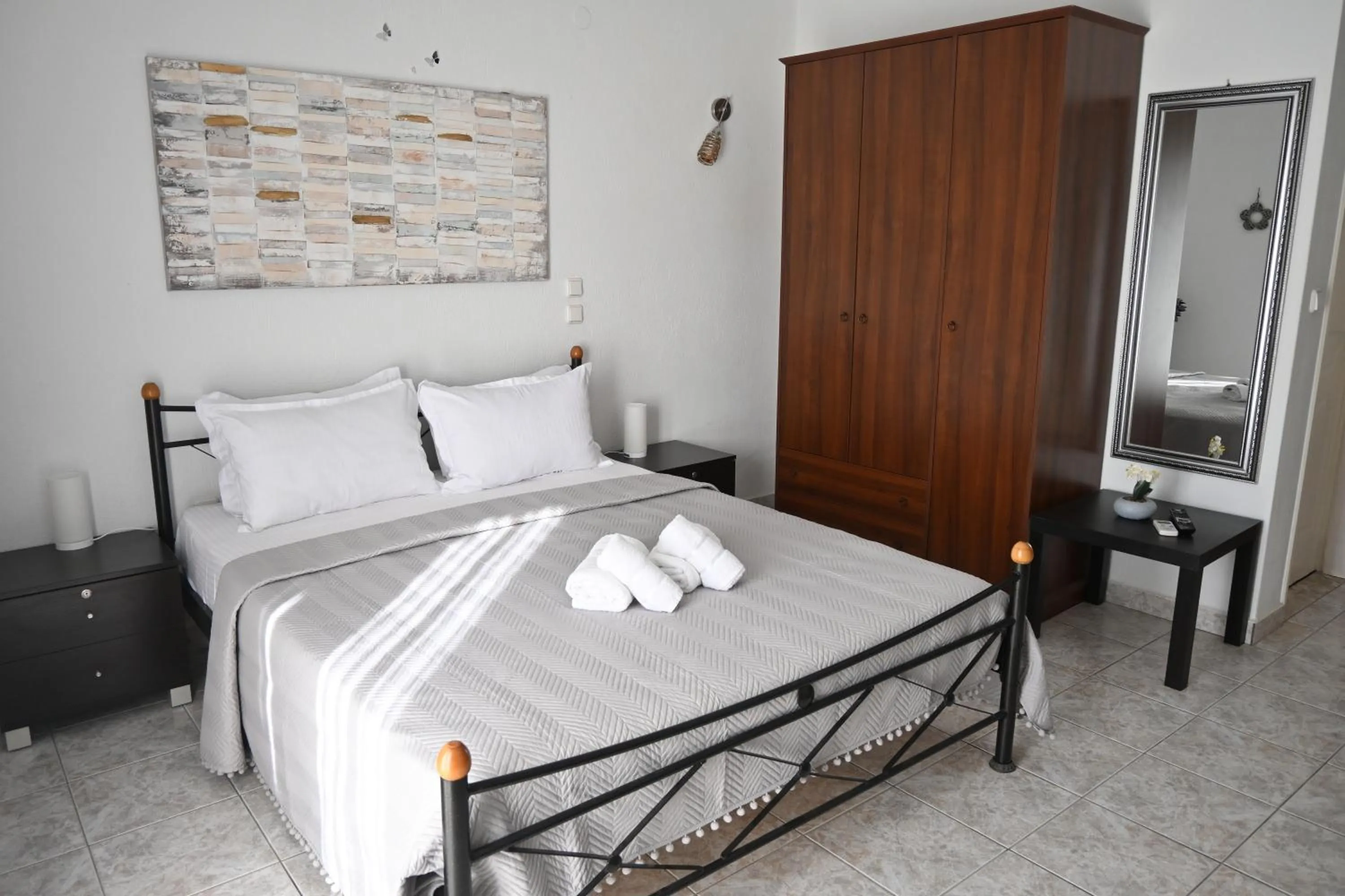 Bed in Doukas Aparthotel