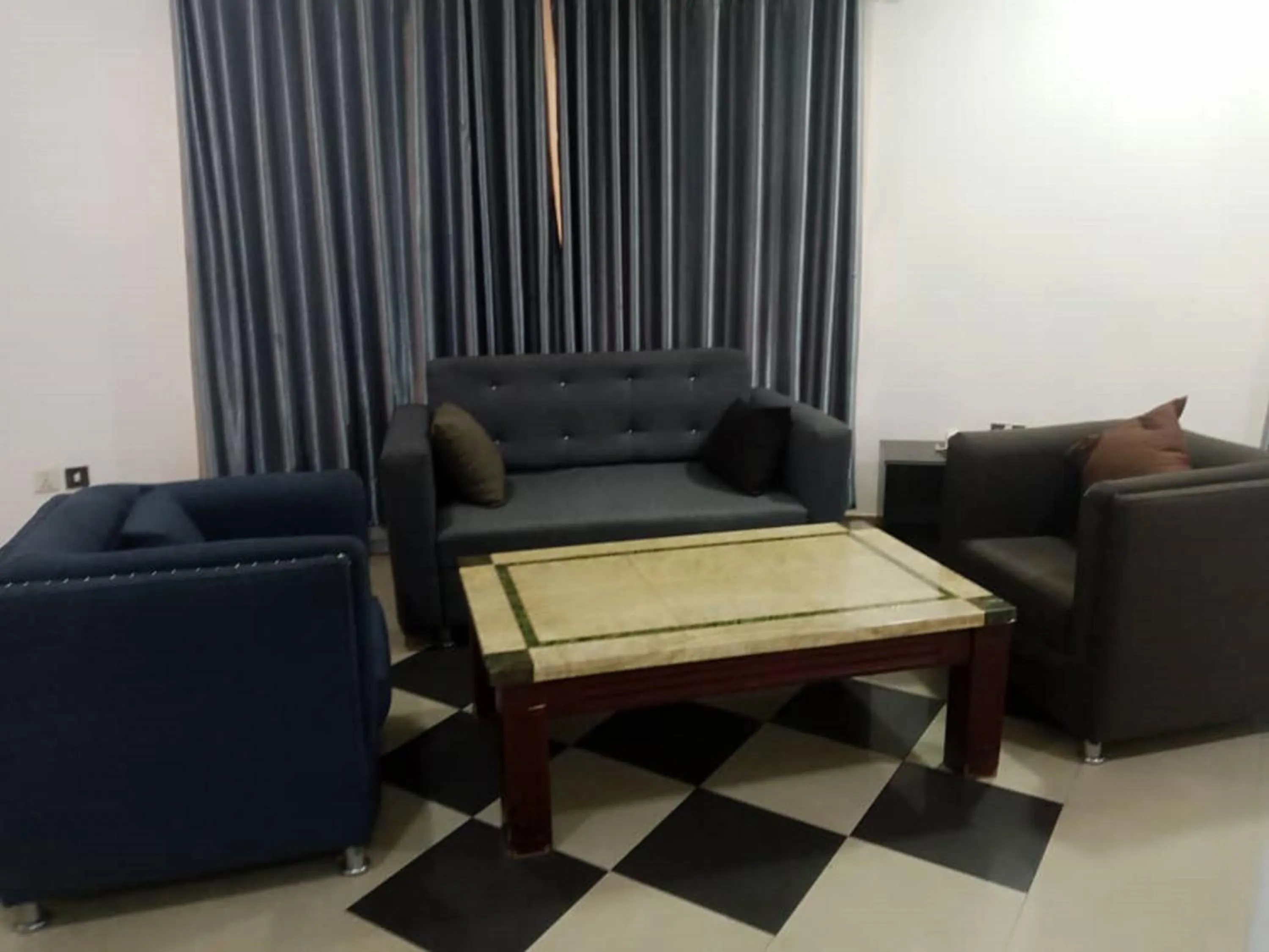 Seating area in 4th Apartment and Suites
