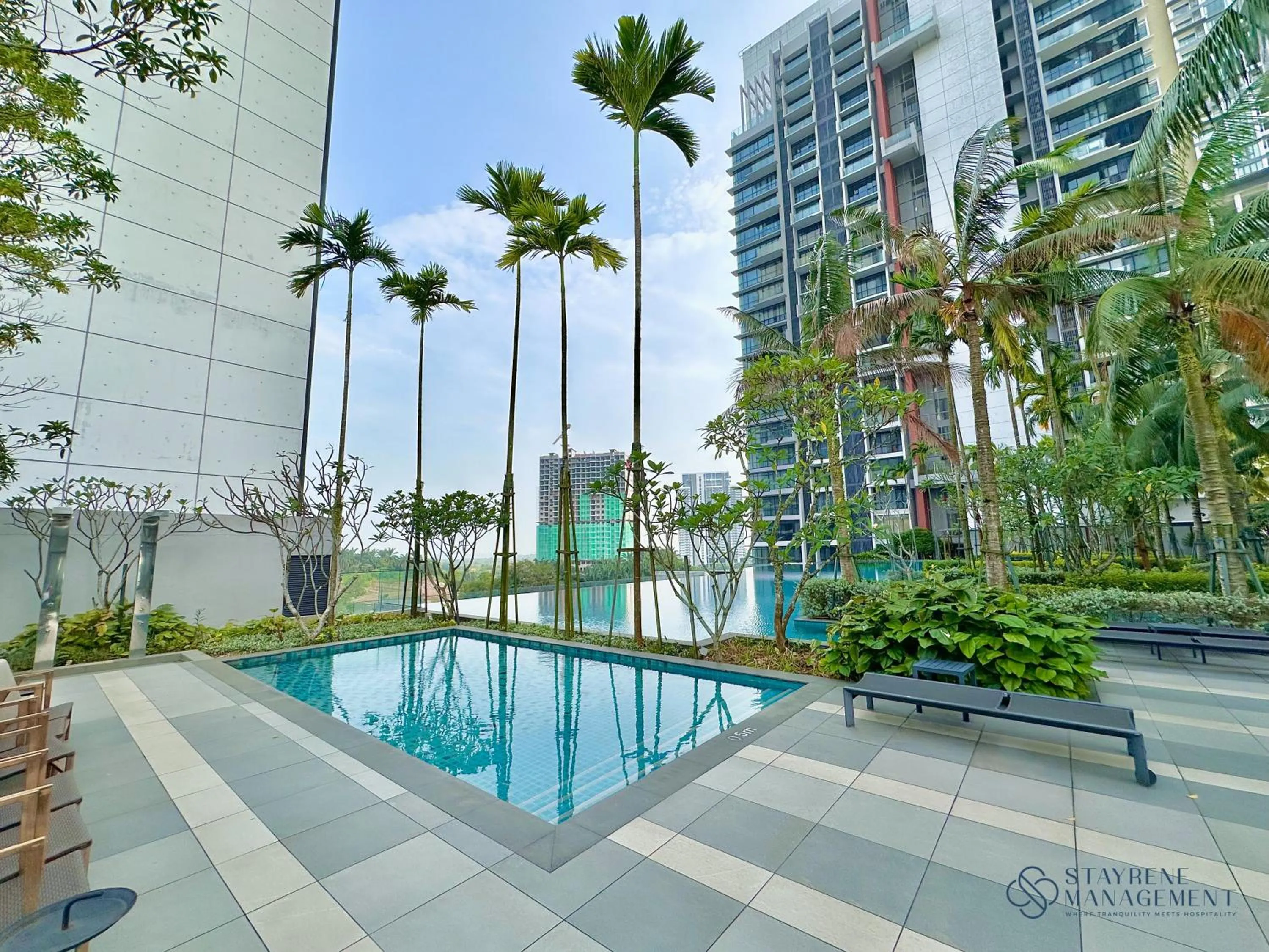 Swimming pool in Grand Medini Residence Nusajaya by Stayrene