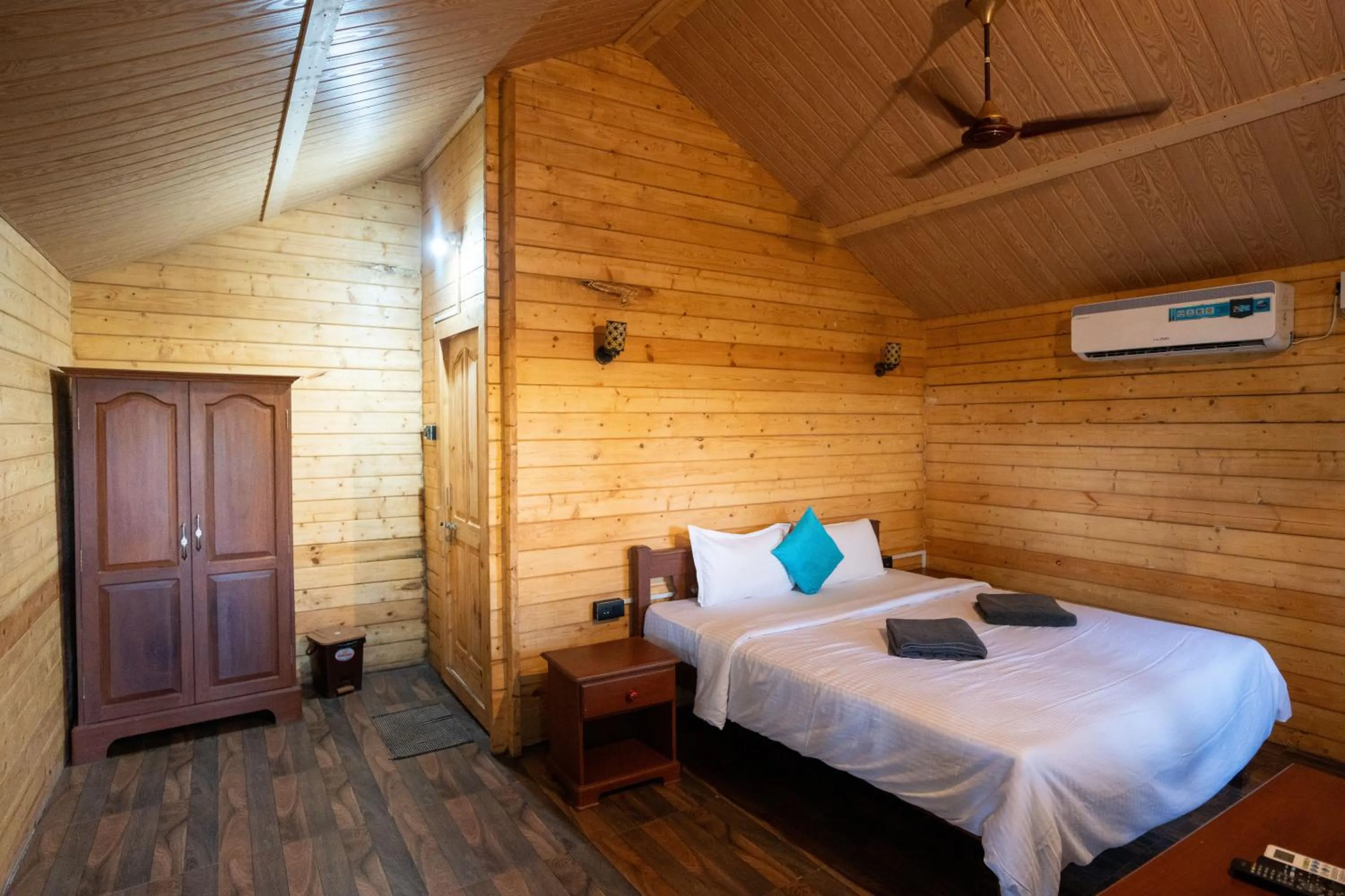 Bed in Nasya Beachside Cottages