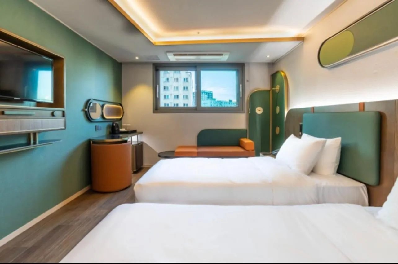 Bed in L&L Central Hotel